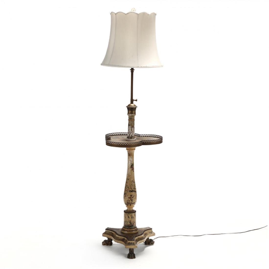 Vintage Italian Chinoiserie Floor Lamp: Vintage Italian Chinoiserie Floor Lampcirca 1940, adjustable height, carved wood standard featuring a trefoil surface with pierced brass gallery, on a tripod base, with brass paw feet, featuring allov