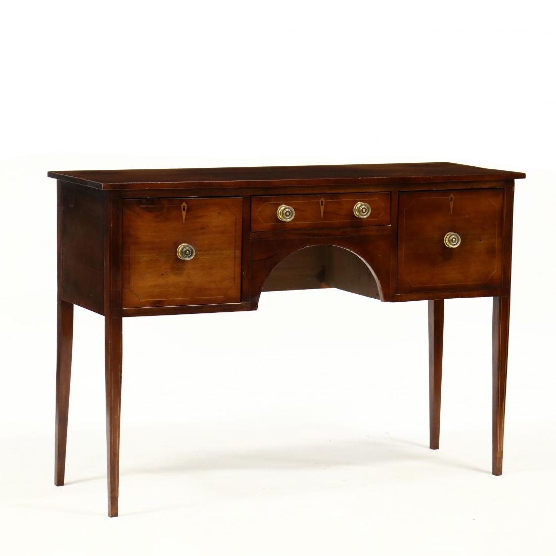Hepplewhite Style Inlaid Mahogany Sideboard: Hepplewhite Style Inlaid Mahogany Sideboard circa 1900, pine secondary, three drawers with light line inlay, on square tapered legs with repeating line inlays. 37 x 53 x 18 in. From the Estate of the 