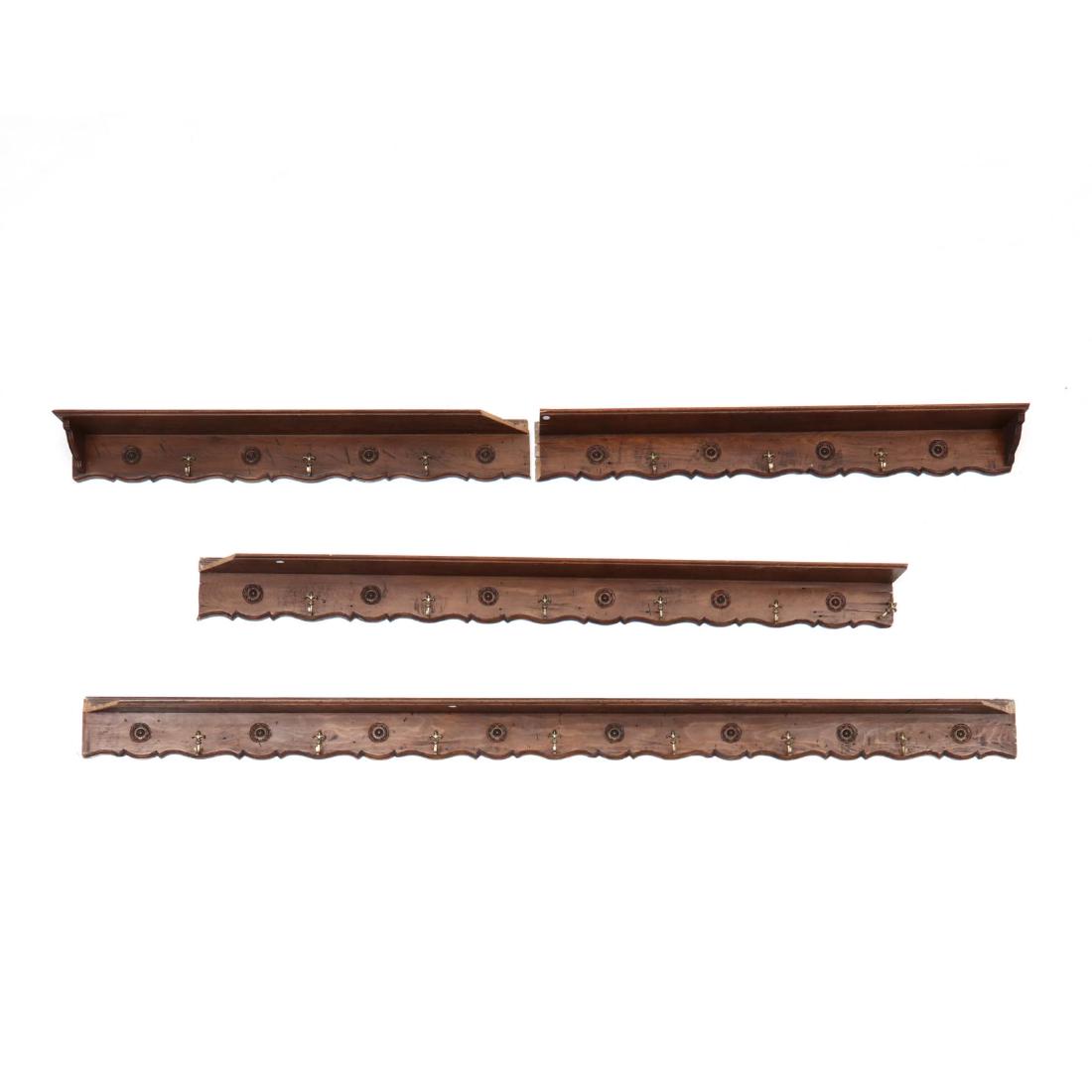 Four-Part Custom French Display Shelf: Four-Part Custom French Display Shelf mid 20th century formed form antique elements, each with a grooved dish shelf over a scalloped panel with carved rosettes and fleur-de-lis brass hooks, three shel