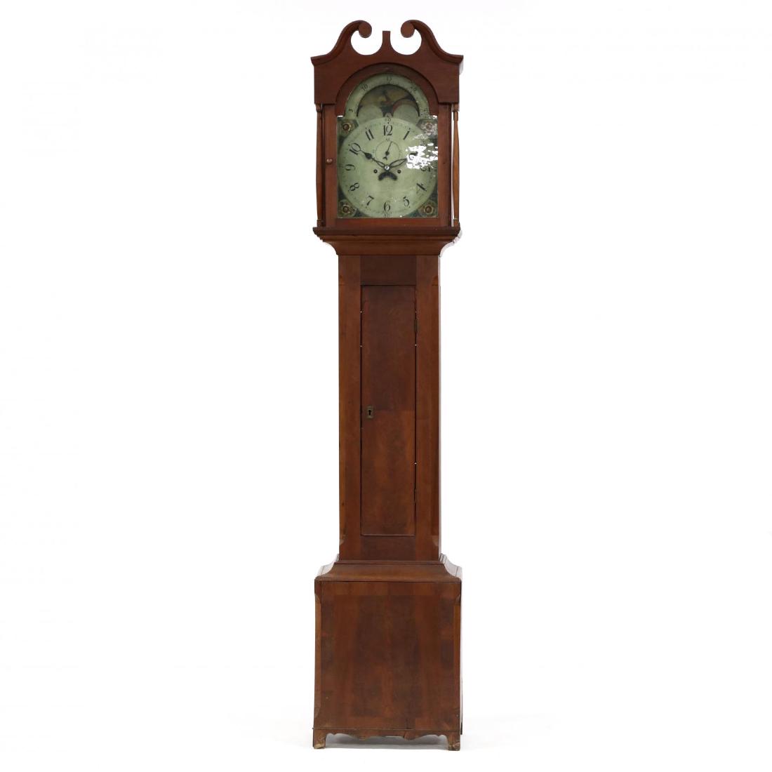 Southern Federal Cherry Tall Case Clock: Southern Federal Cherry Tall Case ClockKentucky, poplar secondary, hood with broken arch pediment, four turned columns, hinged glass tombstone door, painted metal face with second hand and date dial s