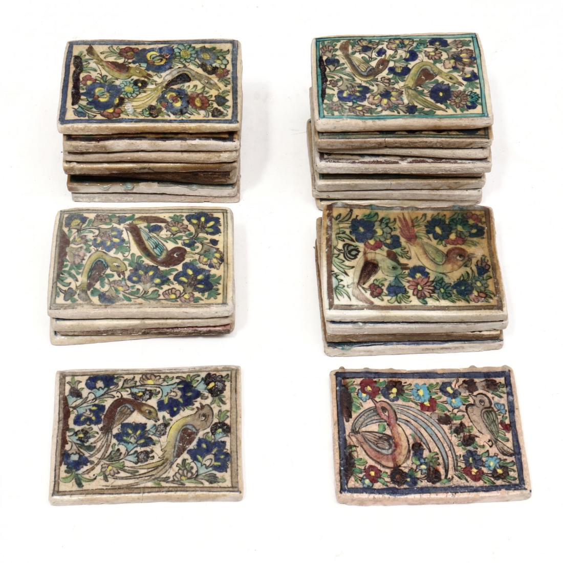 (26) Antique Persian Islamic Bird Tiles: (26) Antique Persian Islamic Bird Tilescirca 1900, hand formed and painted pottery tiles with birds and foliate decoration, unmarked. Each approximately 8 x 6 in. From the Collection of a Gentleman, F