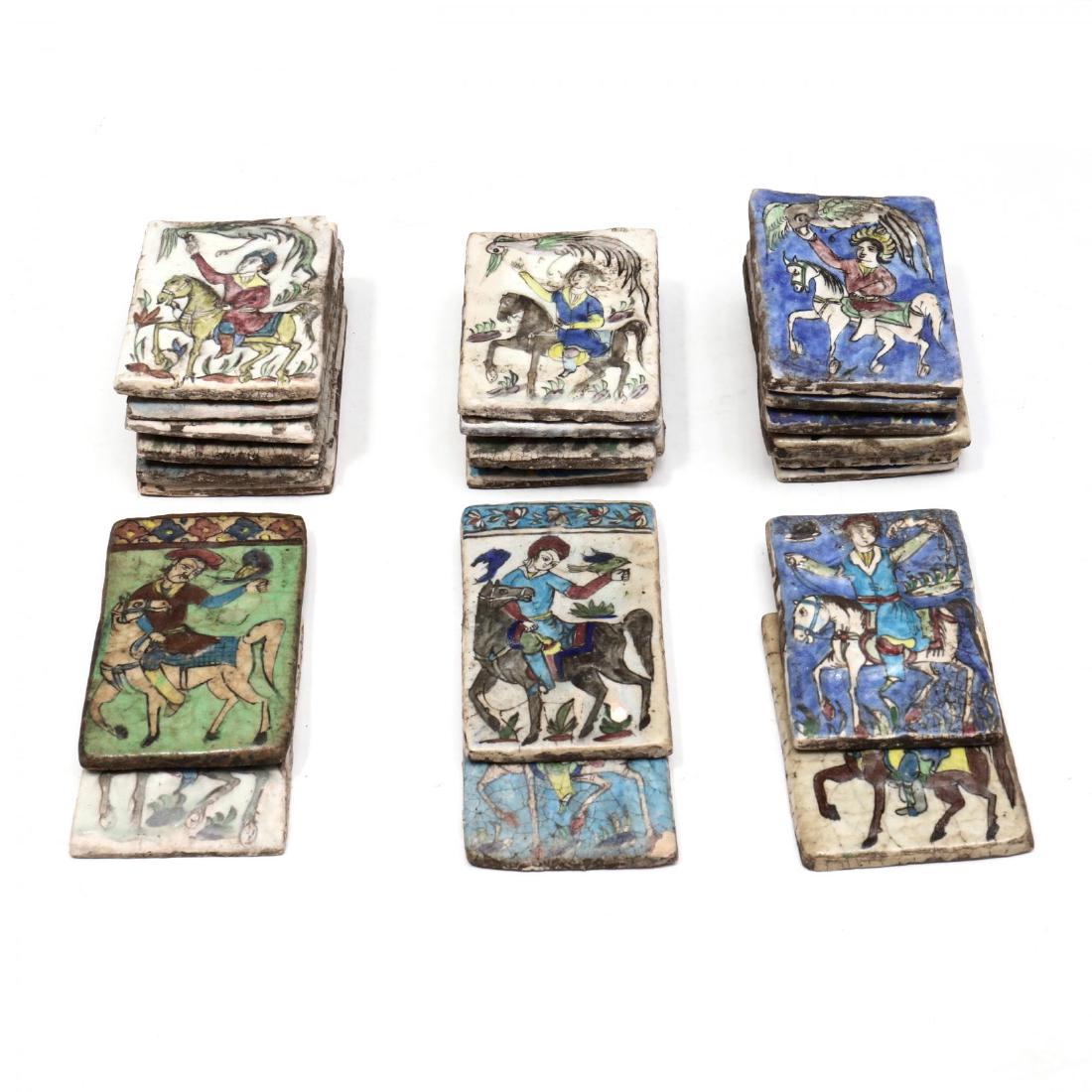 (23) Antique Persian Islamic Decorated Tiles: (23) Antique Persian Islamic Decorated Tileslate 19th century, hand painted with raised decoration of figures on horseback, unmarked. Varying slightly in sizes but average 8 x 5.25 in. From the Collec