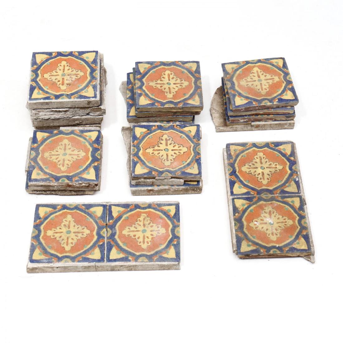 (20) Antique Spanish Glazed Terracotta Tiles: (20) Antique Spanish Glazed Terracotta Tiles 19th century, square tiles with hand painted rosettes in yellow/orange/blue/green. 5 x 5 in. From the Collection of a Gentleman, Florida