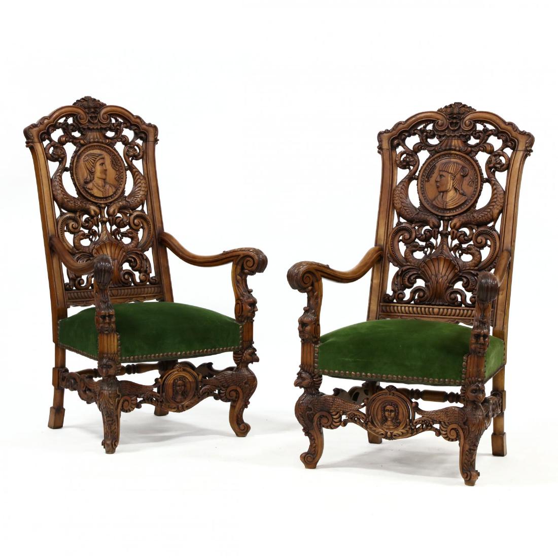 Pair of Spanish Baroque Style Carved Walnut Hall Chairs: Pair of Spanish Baroque Style Carved Walnut Hall Chairs circa 1920, intricate carved and reticulated backs with portrait medallions, birds, acanthus leaf and shell surround, green velvet upholstered s