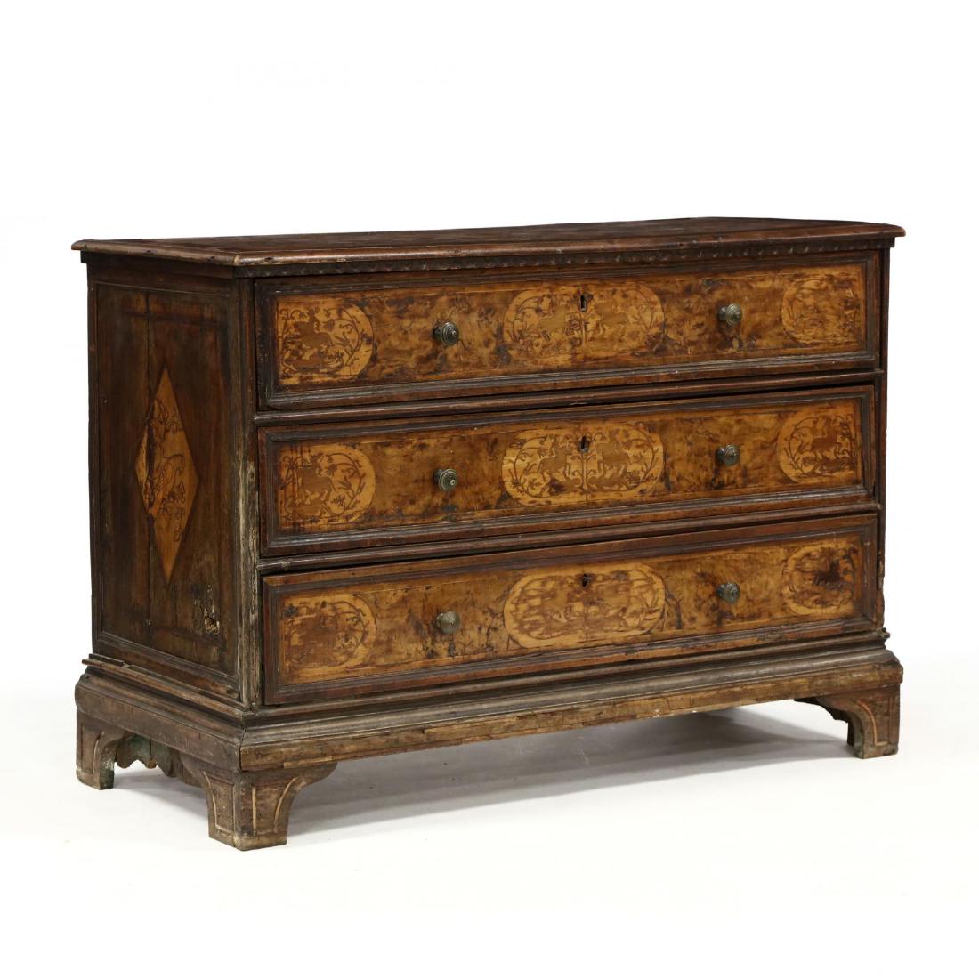 Antique Italian Baroque Inlaid Commode: Antique Italian Baroque Inlaid Commode 18th century, walnut, with burlwood veneers and mixed wood inlays, top with applied molded and gadrooned edge with later exotic wood inlay, three drawers with sy