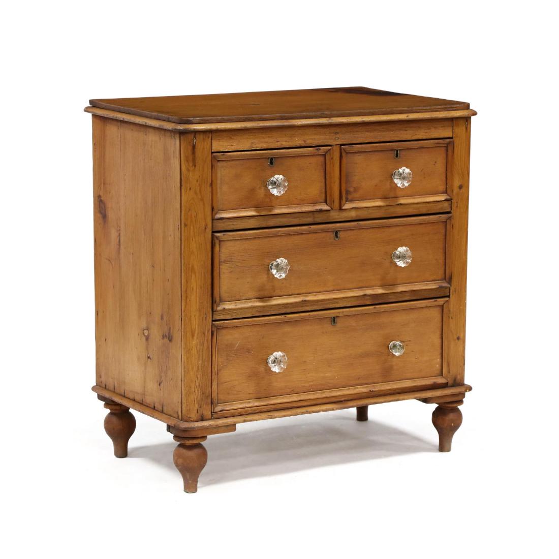 Antique Pine Cottage Chest: Antique Pine Cottage Chestlate 19th century, top with applied molded edge, two over two graduated drawers, on turned feet. 31.5 x 30 x 18.5 in. Collection of Edith Womble Chatham, Pinehurst, North Car