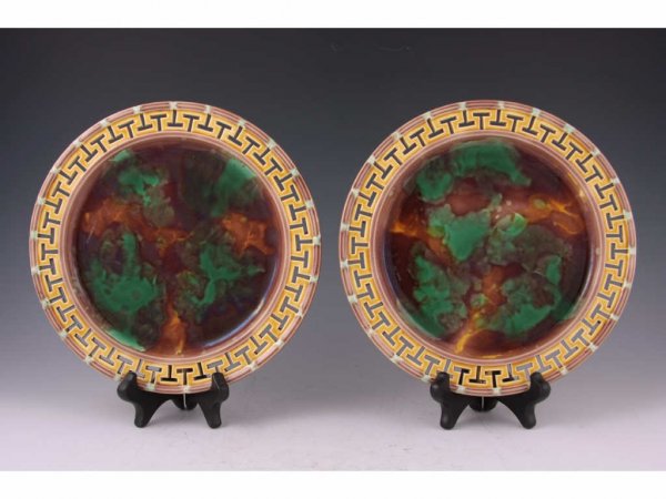 Pair of Wedgwood Majolica Plates, ca. 1870,: Pair of Wedgwood Majolica Plates, ca. 1870, (bottom with impressed XNY, the Y standing for the year 1870) mottled green and brown center with honey colored reticulated Greek key boarder, bottom also i