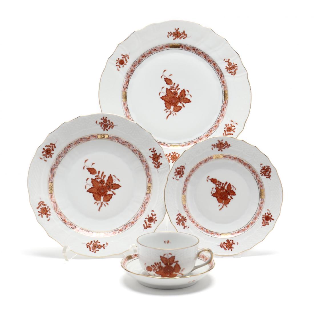 A Set of Herend Tableware (65) Pieces "Chinese Bouquet": A Set of Herend Tableware (65) Pieces "Chinese Bouquet" in the rust palette, to include: (13) dinner plates (10.25 in.); (13) plates (8 7/8 in.); (13) plates (7.25 in.); (13 ) tea cup with accompanyin