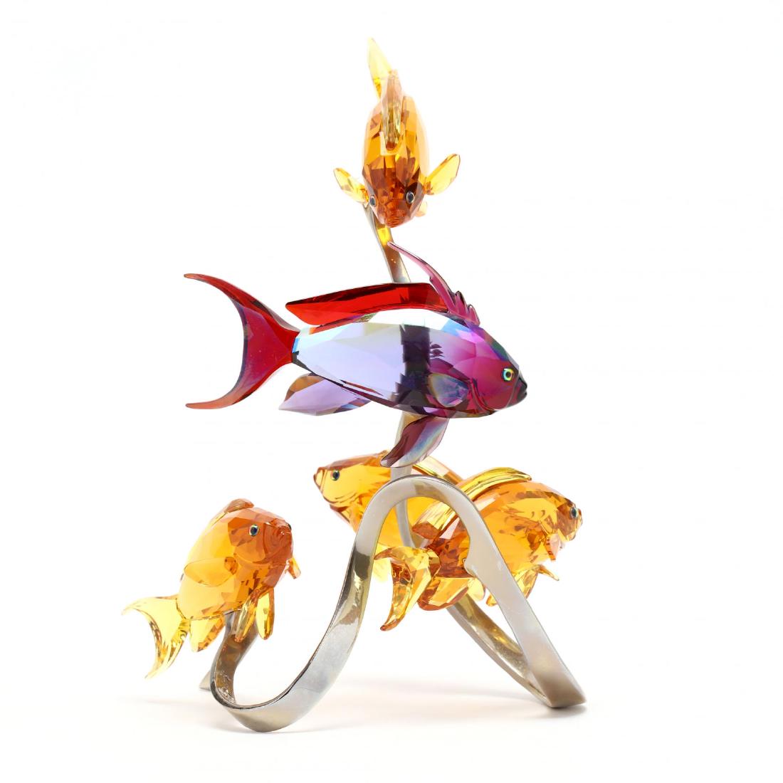 Swarovski, Sea Goldies, Topaz: Swarovski, Sea Goldies, Topazitem #1083778, five multi colored fish set on a white metal mount, marked, with box. 9 x 6 x 5 in. Collection of Stephen Coppala, Charlotte, North Carolina Additional high