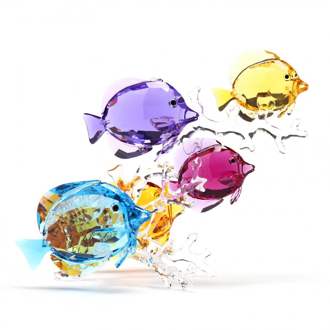 Swarovski, Rainbow Fish Family: Swarovski, Rainbow Fish Family item #5223195, five multi colored fish on a clear crystal branch, marked, with box. 7 x 9 x 5 in. Collection of Stephen Coppala, Charlotte, North Carolina Additional hig