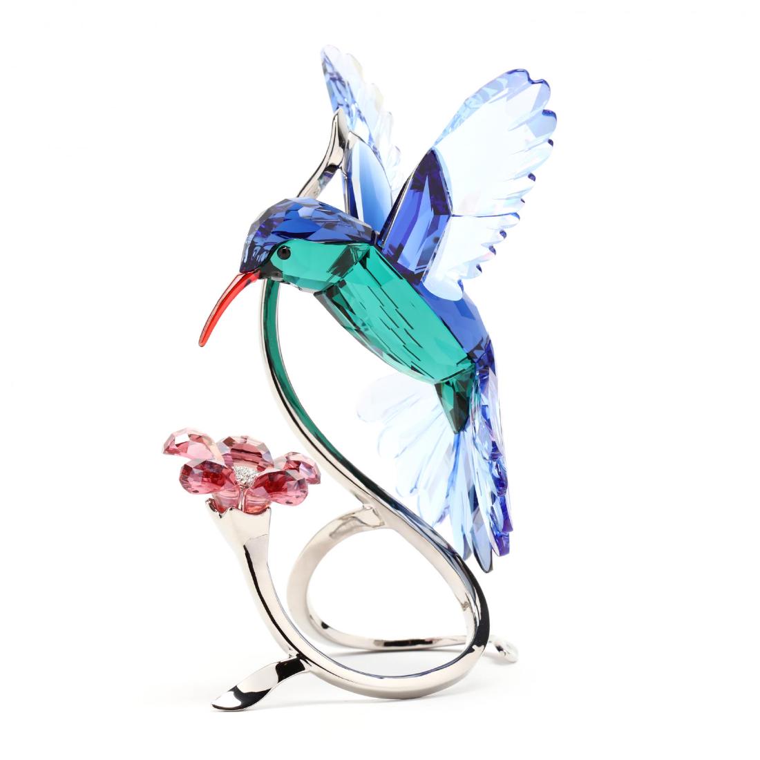 Swarovski, Crystal Paradise Hummingbird: Swarovski, Crystal Paradise Hummingbird item #1188779, multi colored and faceted crystal on white metal mounts, marked, with box. 6.25 x 5 x 4 in. Collection of Stephen Coppala, Charlotte, North Carol