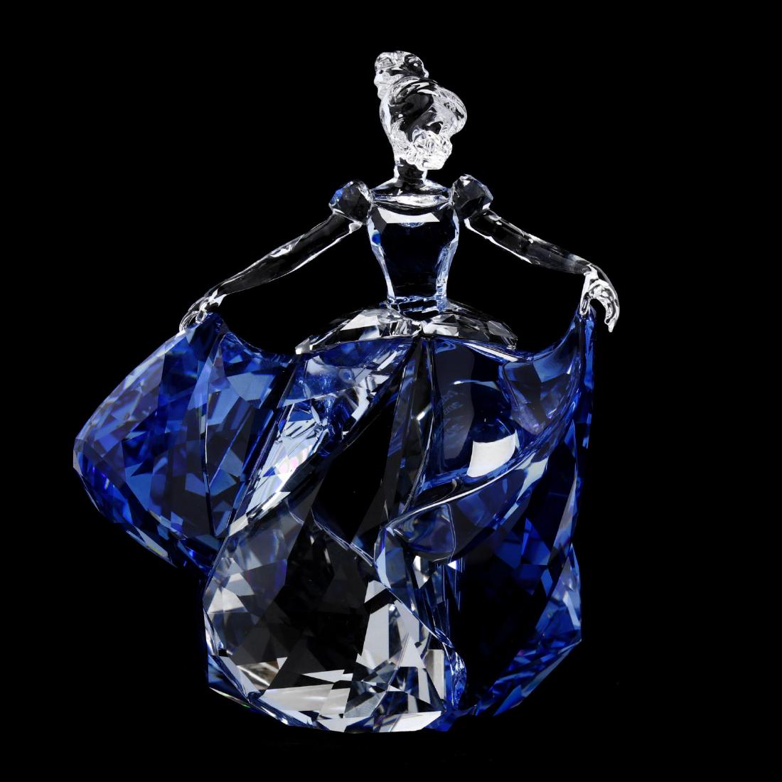 Swarovski, Disney Collection, Cinderella: Swarovski, Disney Collection, Cinderella 2015, clear and blue faceted crystal, signed, with box. 5.5 x 4 x 3 in. Collection of Stephen Coppala, Charlotte, North Carolina Additional high-resolution pho