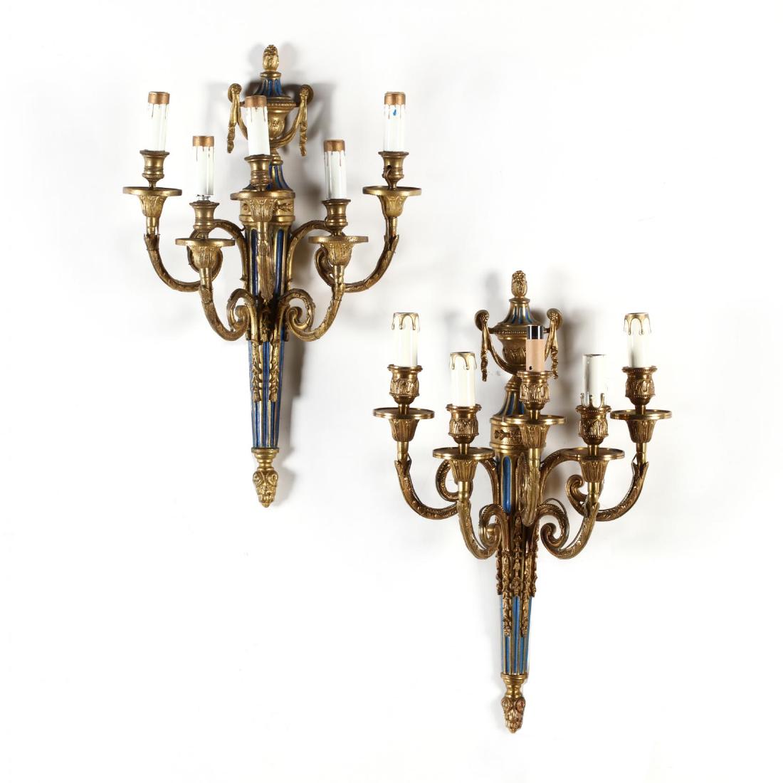 Pair of Louis XVI Style Five-Stem Wall Sconces: Pair of Louis XVI Style Five-Stem Wall Sconces gilt and cobalt decoration, each topped with an urn, electrified with faux candles. 21 in. Additional high-resolution photos are available at LelandLittl