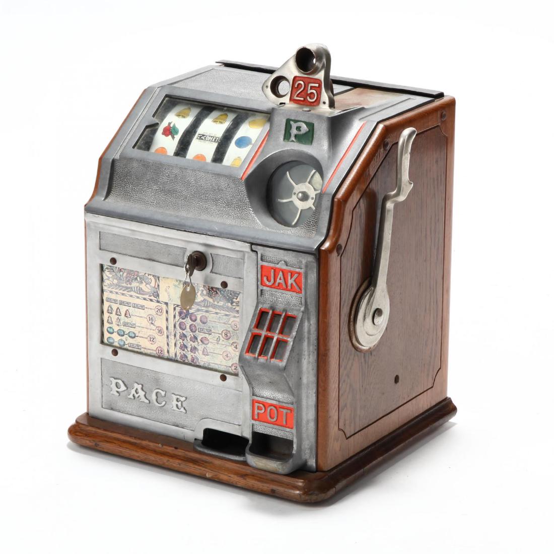 Vintage Slot Machine: Vintage Slot Machine25 cent operable slot machine with an oak and metal case, with key, marked 'Pace' to front panel. 17 x 14 x 14 in. Acquired by the consignor in Atlantic City. Additional high-reso