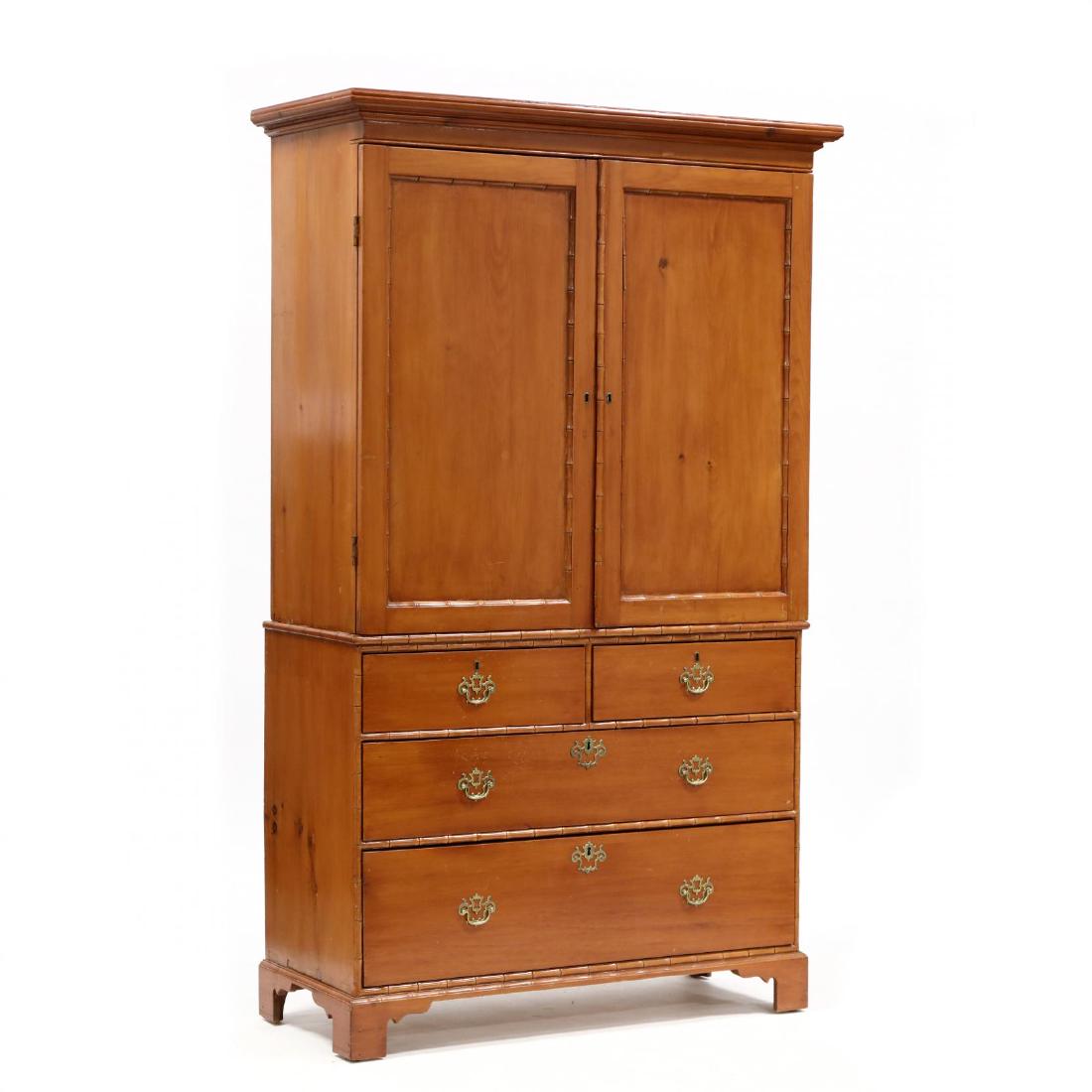 Georgian Style Antique Pine Linen Press: Georgian Style Antique Pine Linen Press mid 19th century, two-part form, top with an applied cornice, two upper hinged panel doors, four interior linen shelves, the base with two side-by-side drawers 