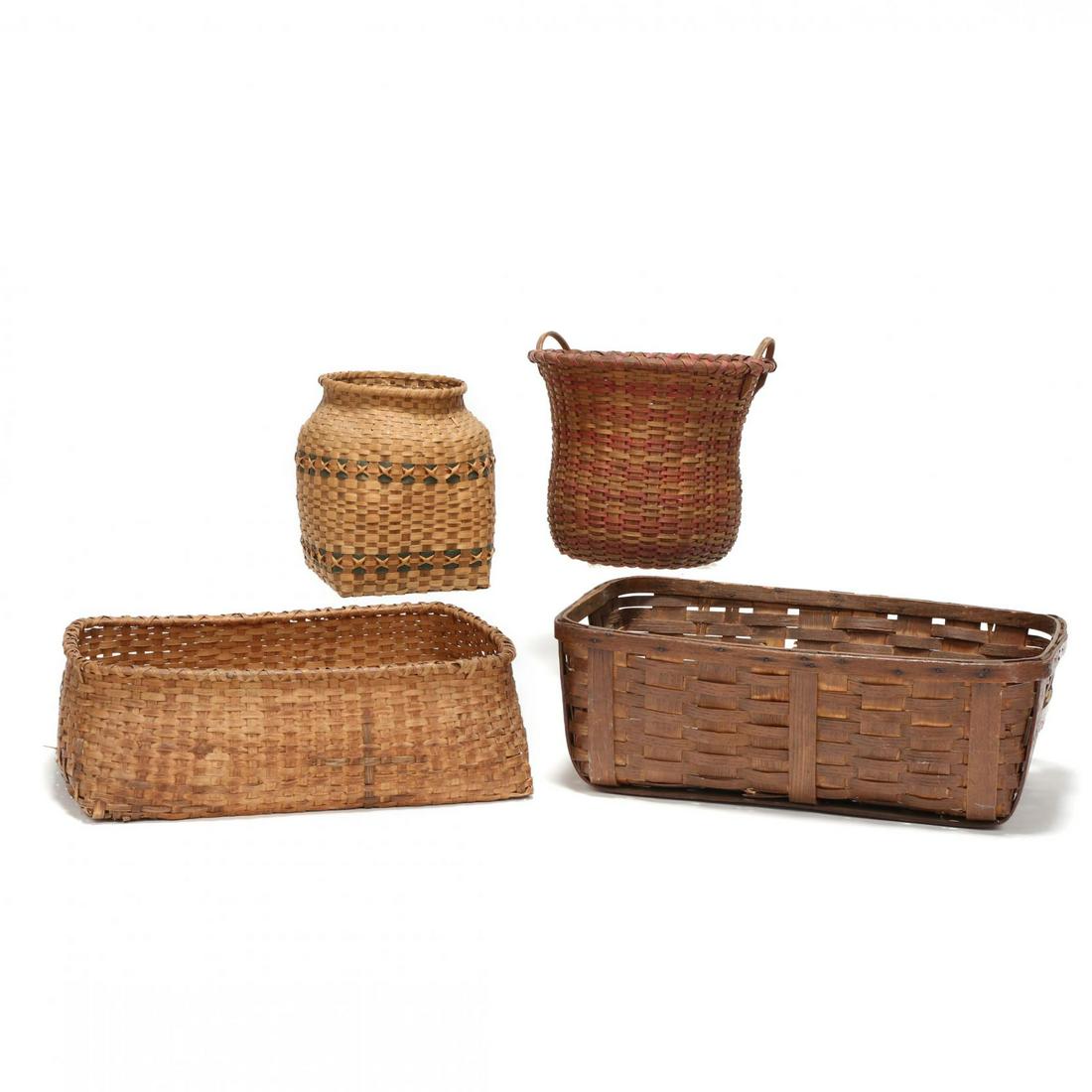 Four Large Baskets: Four Large Basketstwo vintage hampers or wash baskets (both with a break); to contemporary storage baskets, one likely Cherokee. Storage basket with handles 13 x 14.5 in. From the Collection of Mary W