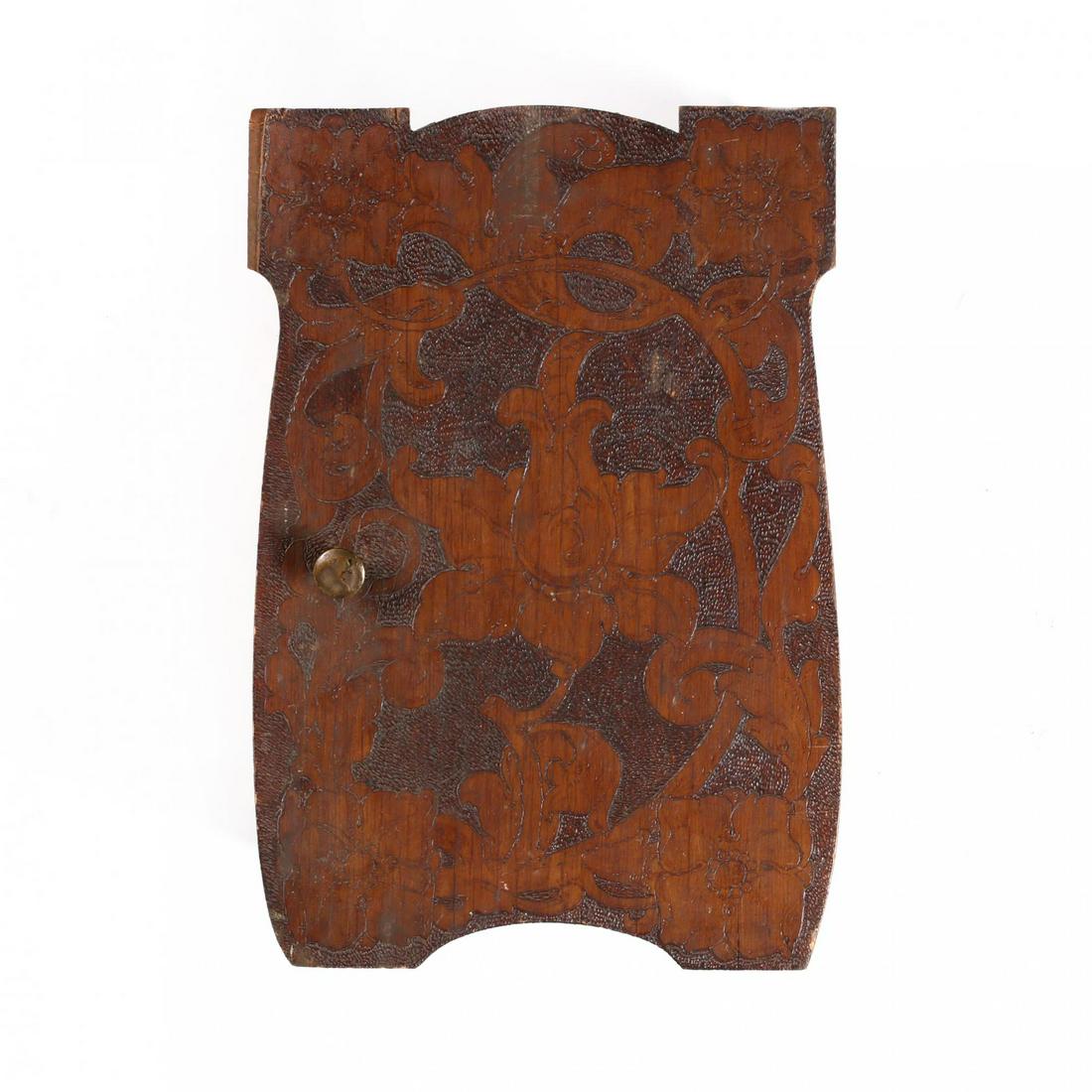 Tramp Art Hanging Medicine Cabinet: Tramp Art Hanging Medicine Cabinet early 20th century in the Art Nouveau taste with relief carved floral decoration, divided and painted interior with repeating carving to sides of case. 19 x 13 x 7 i