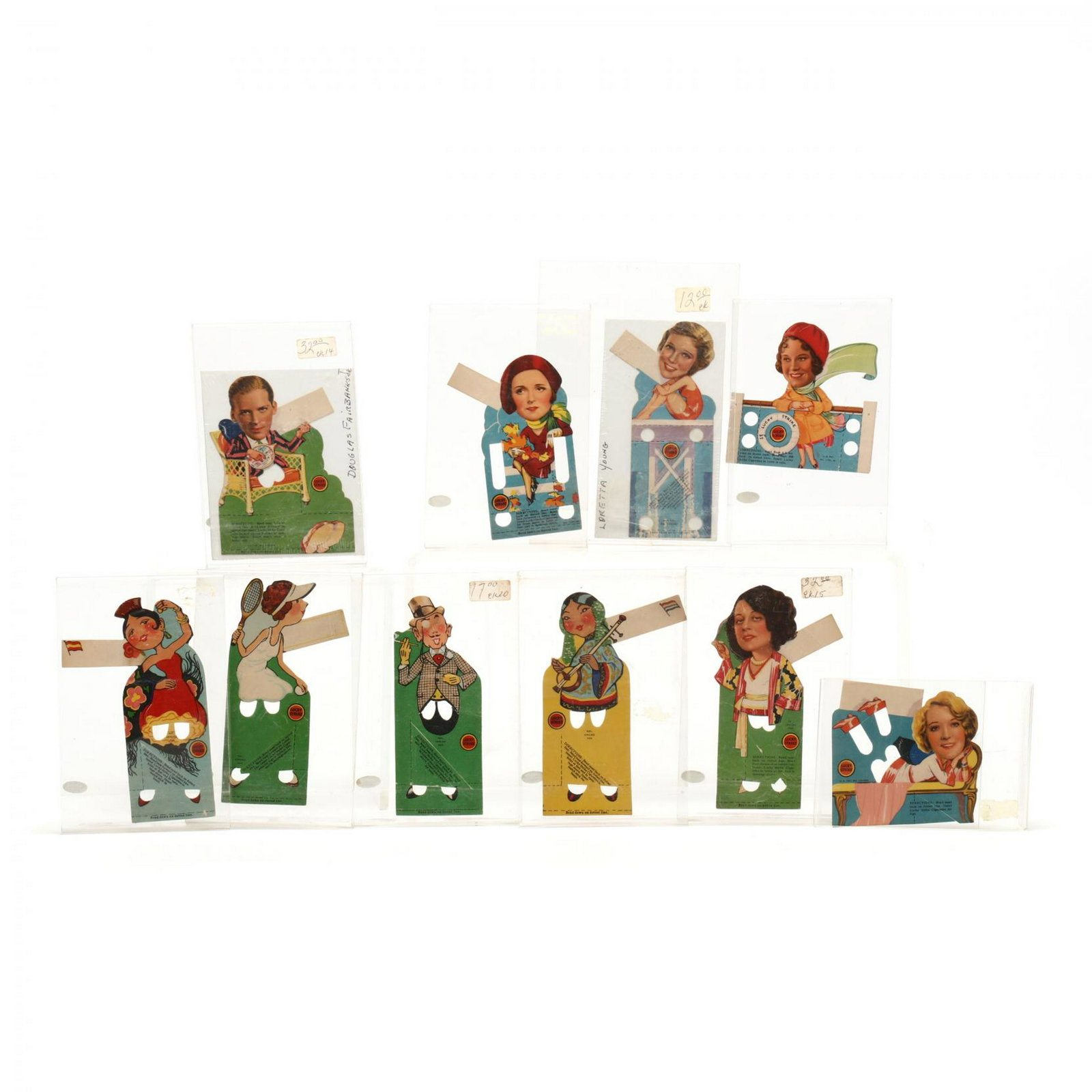 Ten Lucky Strike Cigarette Novelty Advertising Place: Ten Lucky Strike Cigarette Novelty Advertising Place Cards 1930s-1940s, perforated for holding cigarettes, six featuring Hollywood celebrities and four depicting cartoon imaginary characters. Average 