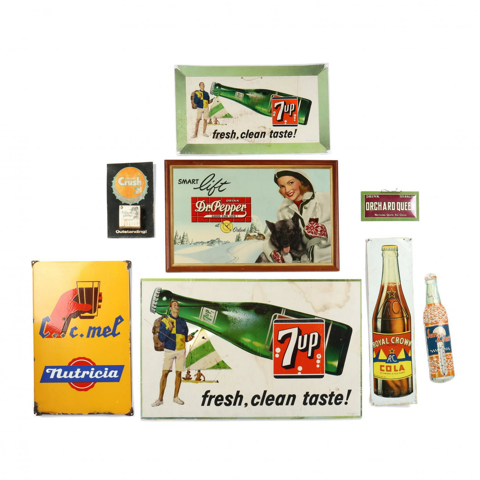 A Group of Vintage Soft Drink Advertising: A Group of Vintage Soft Drink Advertisingeight items; two 7up paper posters (larger 33.5 x 21 in.) (smaller with end tear and soiling); a Sun Crest thermometer; an Orange Crush 1980 unopened calendar;