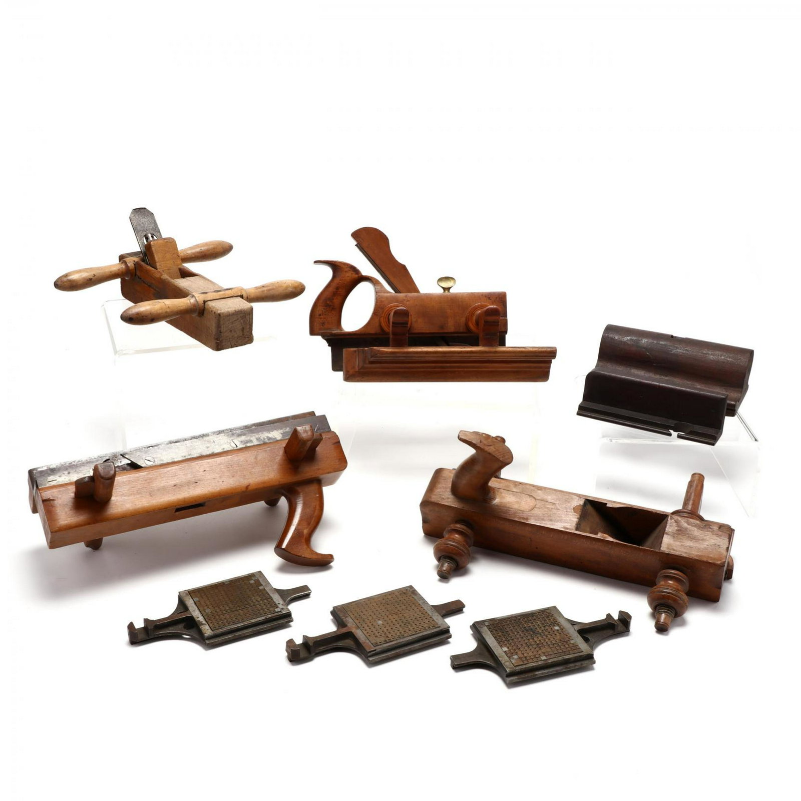 Group of Wood Planes and Die Sets: Group of Wood Planes and Die Sets including five 19th century wood planes, including Sandusky Tool Co., John Belt, H. Chapin Union Factory, GHG, and Goluenberg; and three iron type die sets Longest 14
