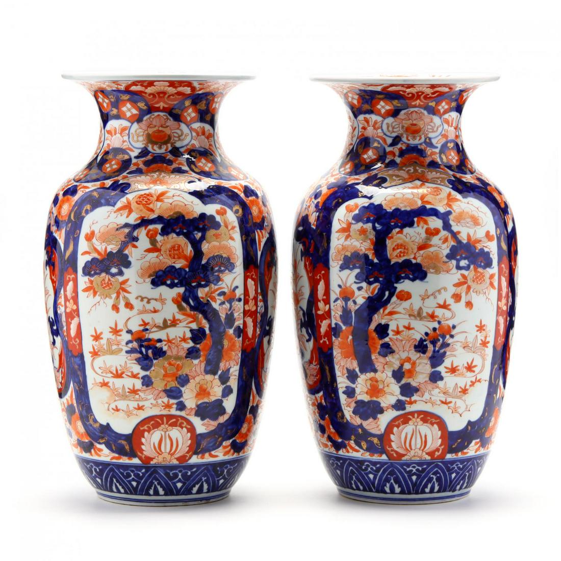 A Pair of Large Chinese Mirrored Imari Vases: A Pair of Large Chinese Mirrored Imari Vases 19th century, large wide mouthed porcelain vases beautifully hand painted in identical manner with cobalt blue, iron red, and gilt, with Chinese motifs of 