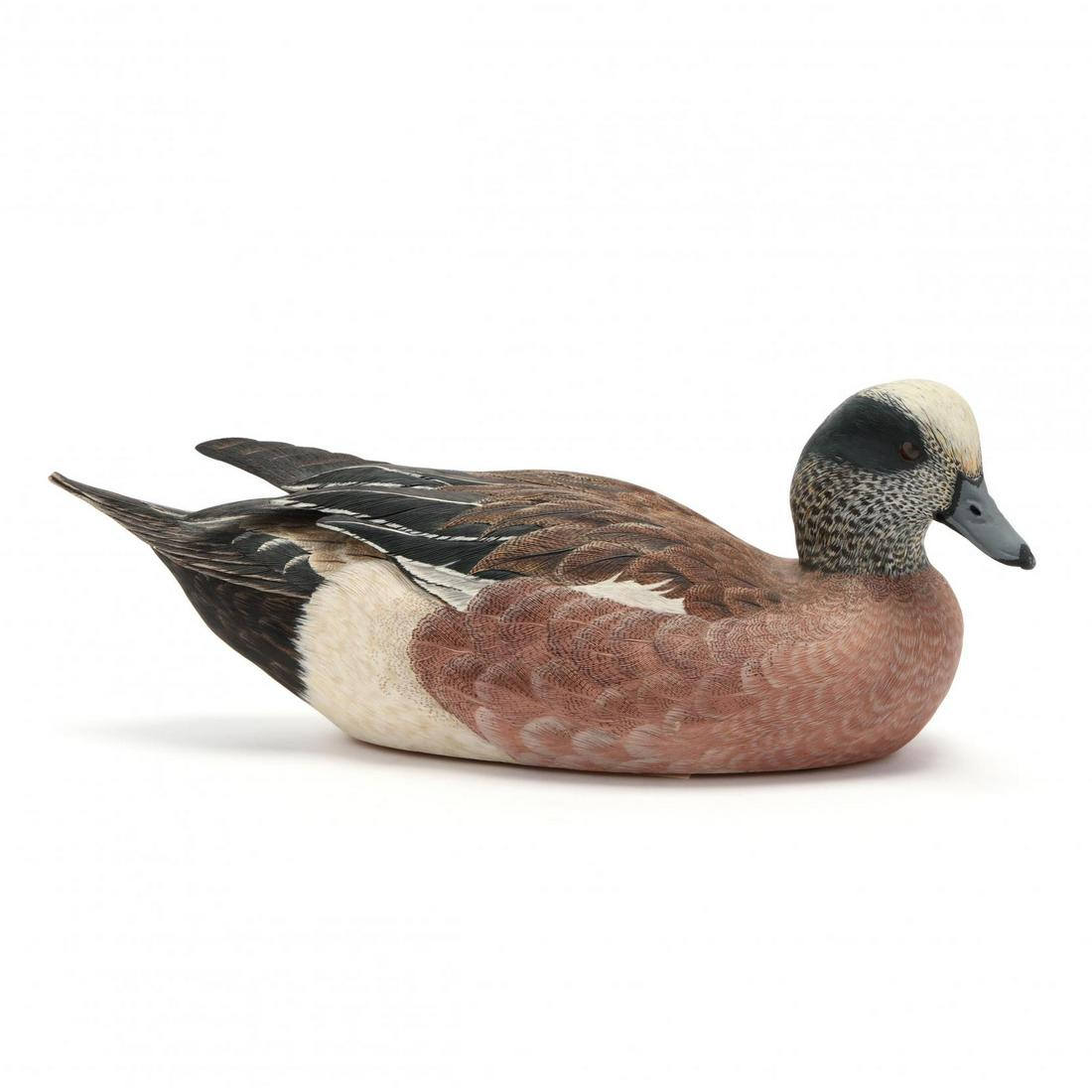Jeanne B. Hiss (MD), Wigeon Drake Decoy: Jeanne B. Hiss (MD), Wigeon Drake Decoy 1989, carved and painted wood, hollowed form, inset glass eyes, signed. 14.5 in. Frank and Frank Decoys, September 2011, Lot 106. Collection of John and Peggy A