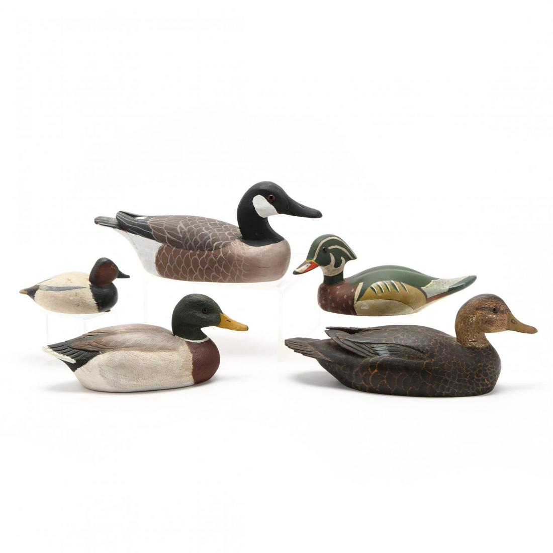 Five Small Vintage Duck Decoys: Five Small Vintage Duck Decoysincluding a 1968 Black Duck by T. Carlock; a 1976 red headed duck by Bob White; a 1975 drake Mallard by Bob McGuire; a Boeh's Cabinet Shop green duck; C. (Pete) Wilber go