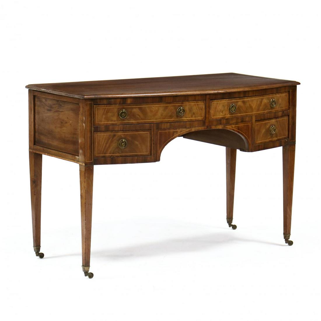 English Hepplewhite Inlaid Mahogany Dressing Table: English Hepplewhite Inlaid Mahogany Dressing Table early 19th century, shaped top with molded edge, case with four banded drawers, banded returns, recessed panel sides, raised on square tapered legs w