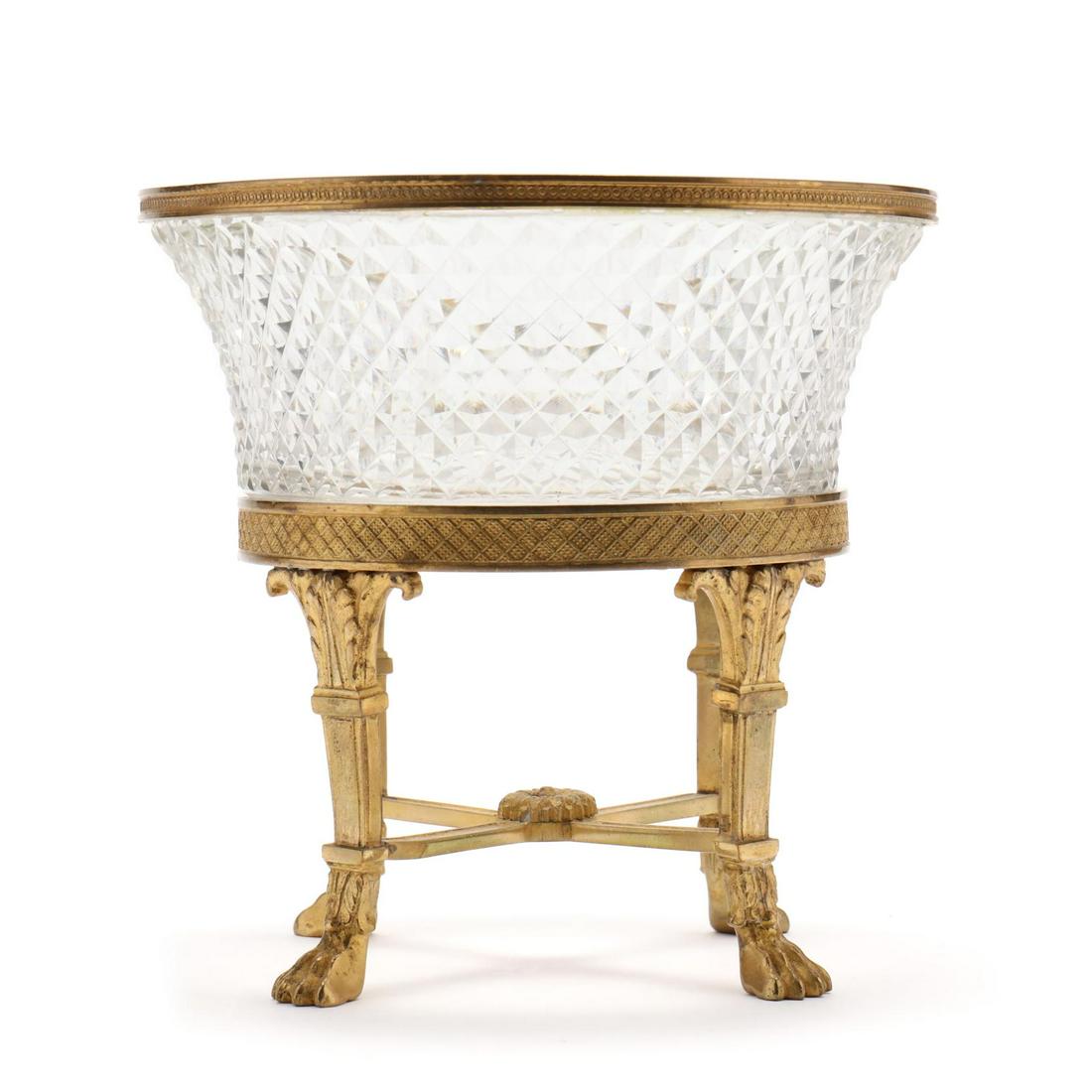Napoleon III Cut Glass and Ormolu Cachepot: Napoleon III Cut Glass and Ormolu Cachepot 19th century, two part form, tapered diamond cut glass bowl with applied ormolu rim set on an acanthus leaf and paw foot base. 5.5 x 5.75 in. diameter Additi
