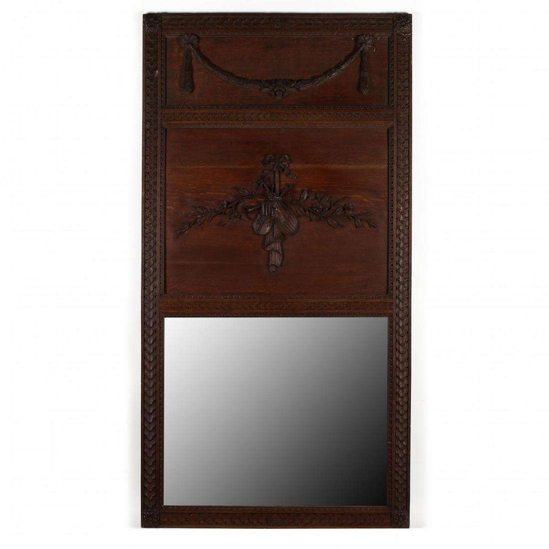 Large Antique French Carved Oak Trumeau: Large Antique French Carved Oak Trumeau late 19th century, double panel frame with floral swag and musical motif, raised scale design surround, lower rectangular mirror. 86 x 45.5 in. Additional high-