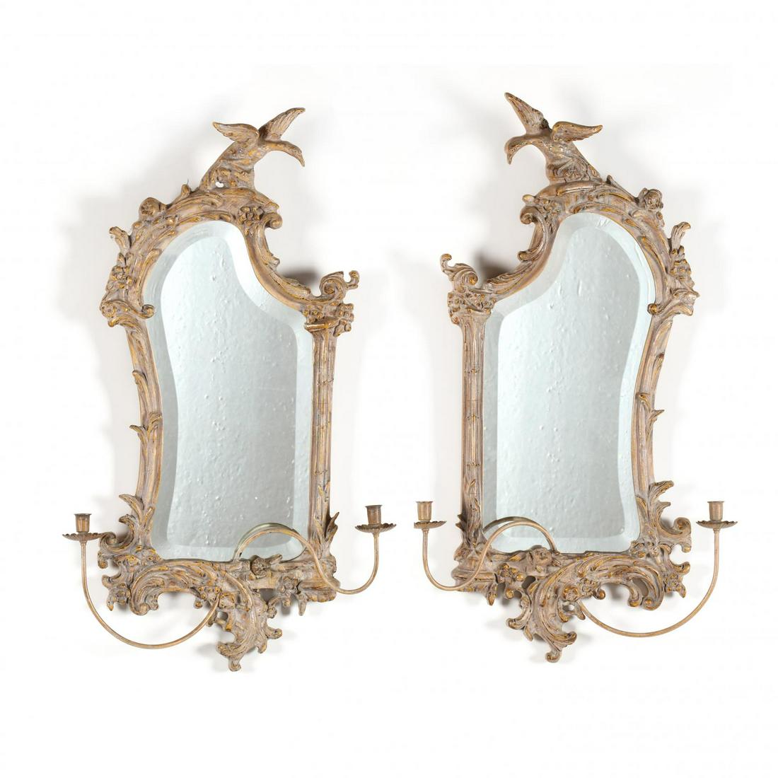 Friedman Brothers, Pair of Italian Rococo Style: Friedman Brothers, Pair of Italian Rococo Style Mirrored Sconces late 20th century, wood with antiqued painted surface, asymmetrically carved frames, with ho-ho birds, shaped beveled mirrors, with cur