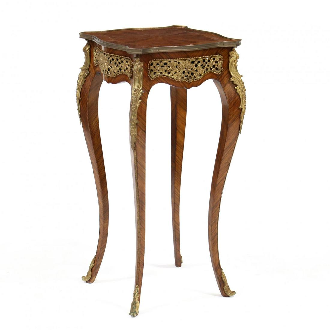 French Parquetry and Ormolu Side Table: French Parquetry and Ormolu Side Table late 20th century, kingwood veneers, shaped top with ormolu border, reticulated ormolu skirt raised on tall cabriole legs with ormolu edge. 30.5 x 14.5 x 14.5 in