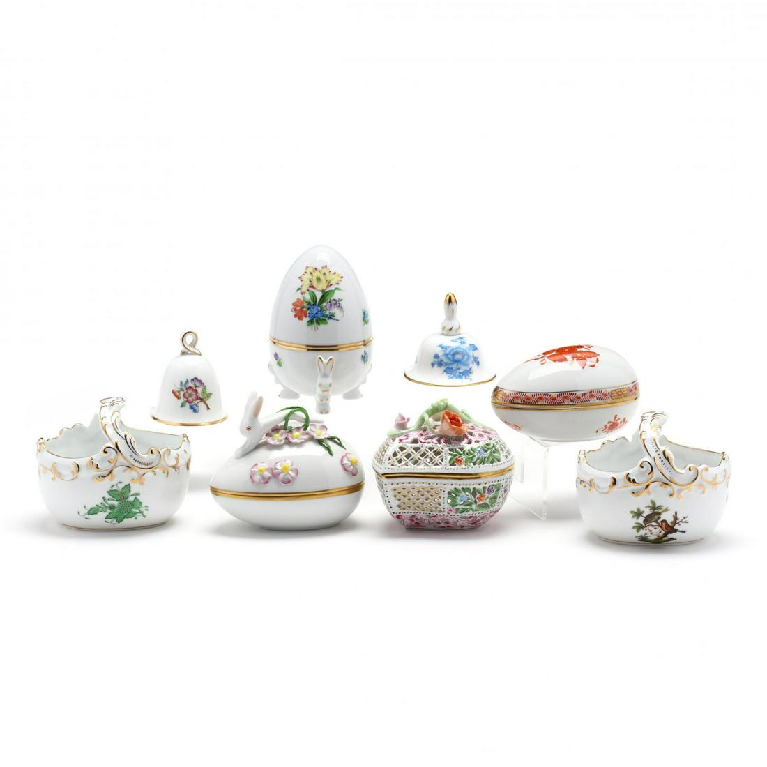 Eight Herend Porcelain Decorative Accessories: Eight Herend Porcelain Decorative Accessories three eggs, two small open baskets, two bells, a heart shaped potpourri in box. 4 x 4.5 in. Private Collection, Greensboro, NC Additional high-resolution 