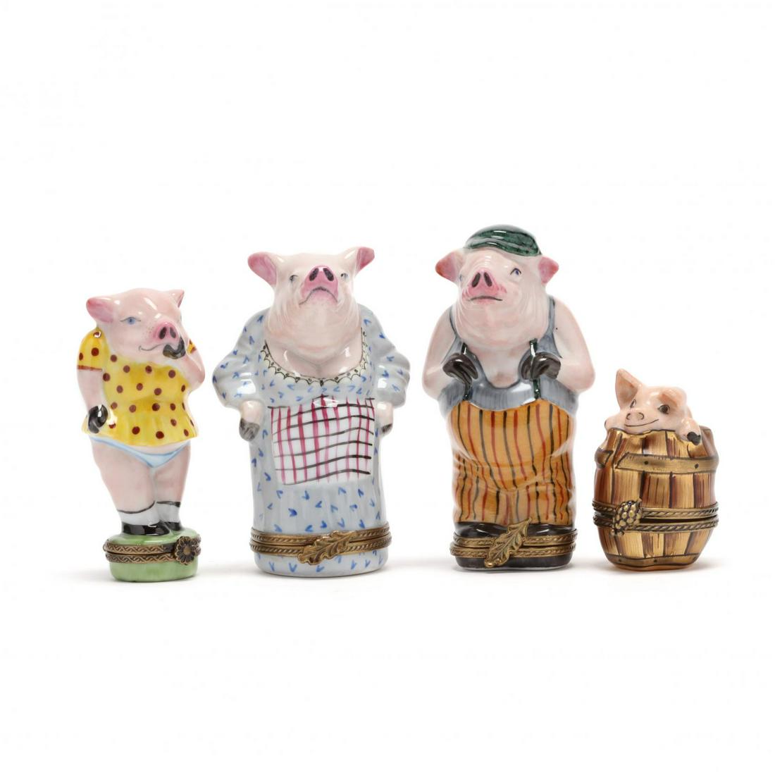 A Group of Limoges Four Animal Pill Boxes: A Group of Limoges Four Animal Pill Boxes made in France, Papa Pig, Mama Pig, Little Girl Pig and a pig in a barrell. Pig 4 in. Private Collection, Greensboro, NC Additional high-resolution photos are