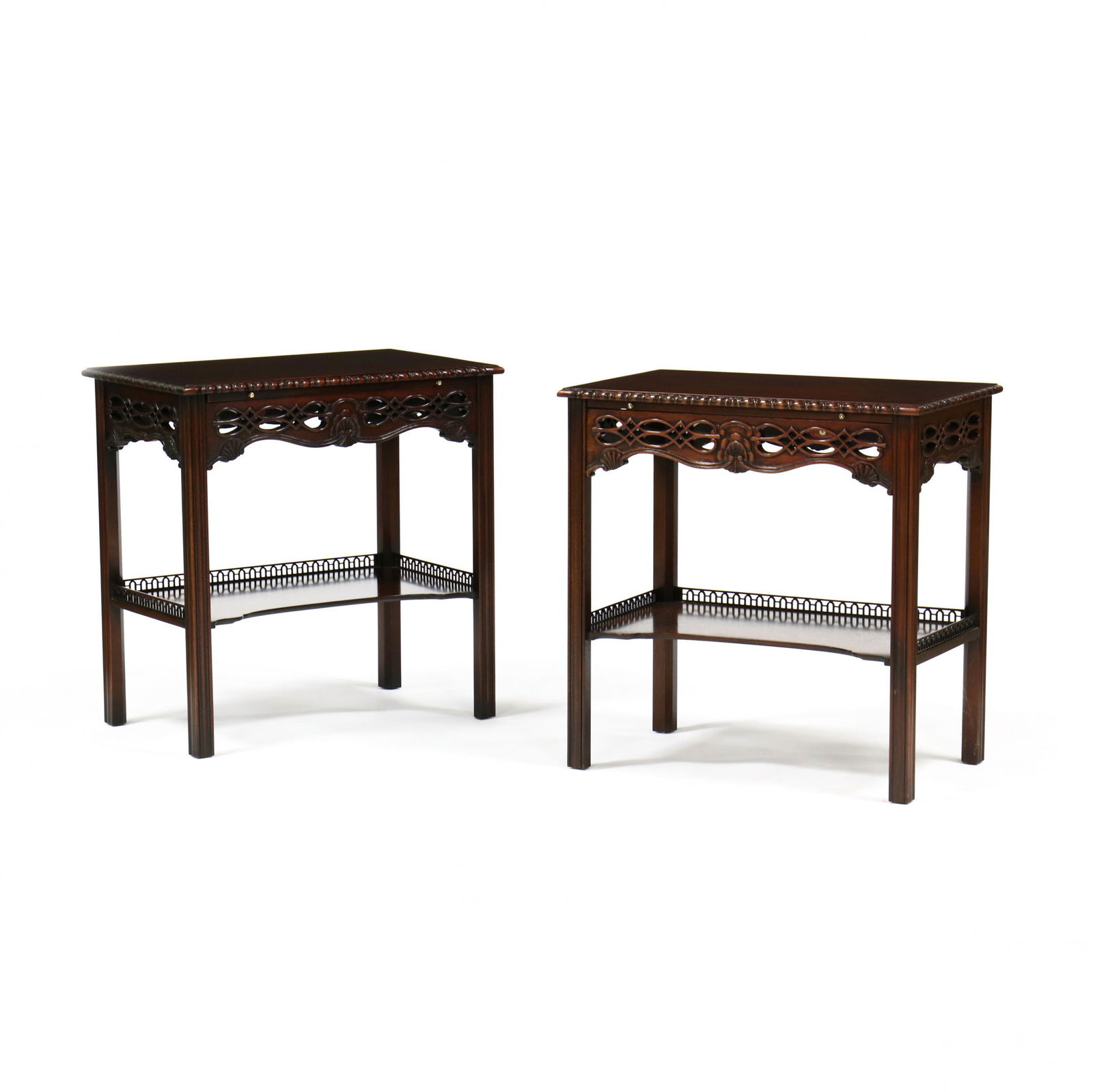 Wellington Hall, Pair of Chinese Chippendale Style: Wellington Hall, Pair of Chinese Chippendale Style Mahogany Tea Tableslate 20th century, rectangular form, carved rope twist edge, reticulated and shell-carved skirt, with pull-out slide, shaped lower
