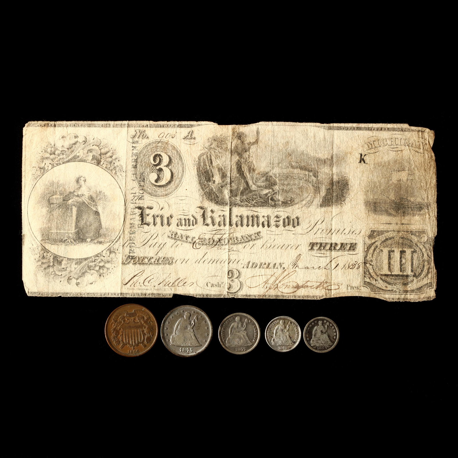 Five 19th Century Type Coins and an Obsolete Bank Note: Five 19th Century Type Coins and an Obsolete Bank Note to include: 1875-S 20å¢, VG/F; 1877-CC 10å¢, F/VG, reverse marks; 1853 1/2 Dime, VG; 1871 1/2 dime, VF+, cleaning scratches; 1866 2å¢, Fine