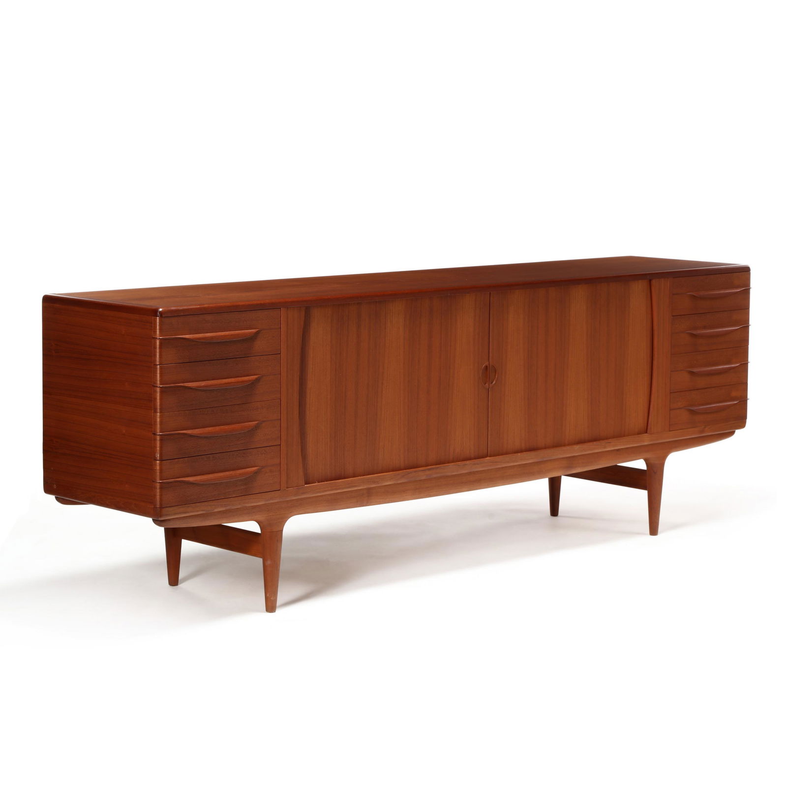 att. Arne Vodder (Denmark, 1926-2009), Large Modern: att. Arne Vodder (Denmark, 1926-2009), Large Modern Teak Sideboard1960s, long rectangular form with rounded corners, central finely crafted tambour doors with shelved and divided interior flanked by f