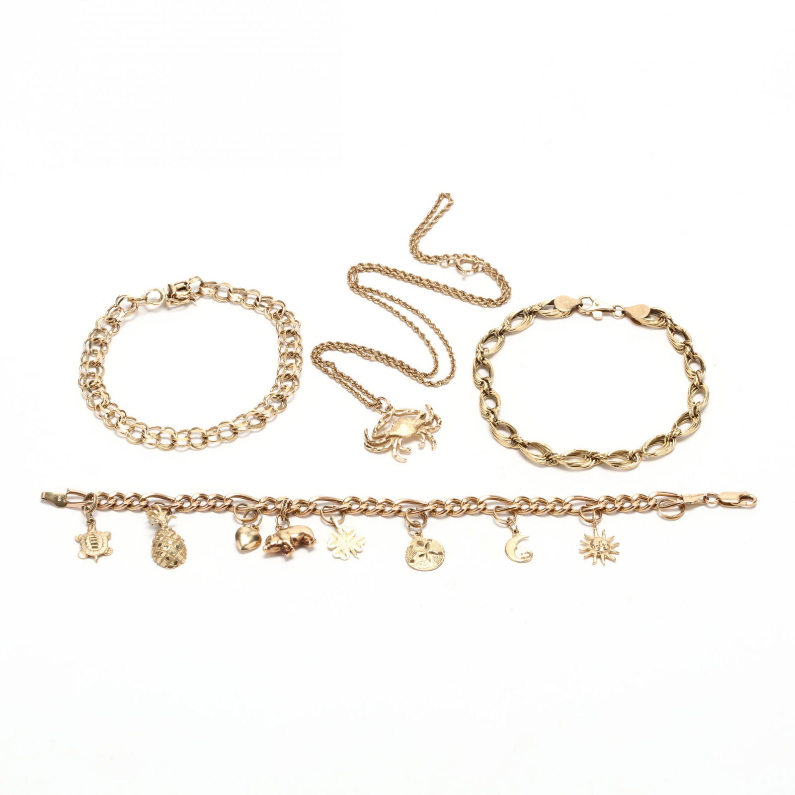 Four Gold Jewelry Items: Four Gold Jewelry Itemsto include two gold link bracelets, each stamped 14K (7.5 in. and 8.25 in.); a charm bracelet with eight charms in various motifs, five stamped 14K and three testing 14K, bracel