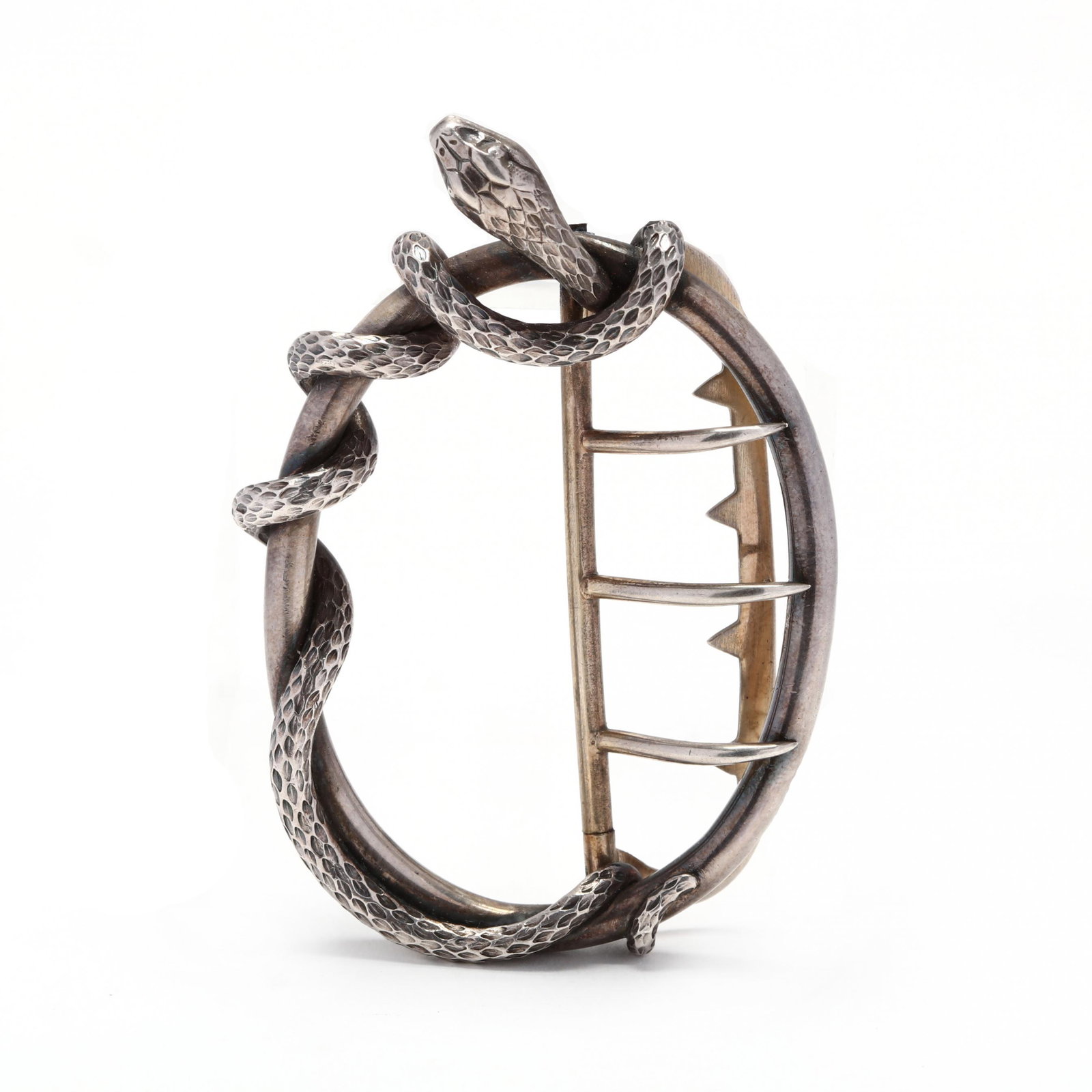 Vintage Silver Serpent Motif Belt Buckle: Vintage Silver Serpent Motif Belt Buckle of oval form with a coiled serpent, with hallmark and maker's mark GB separated by a fleur de lis within a diamond shape lozenge, with additional markings. 1 7