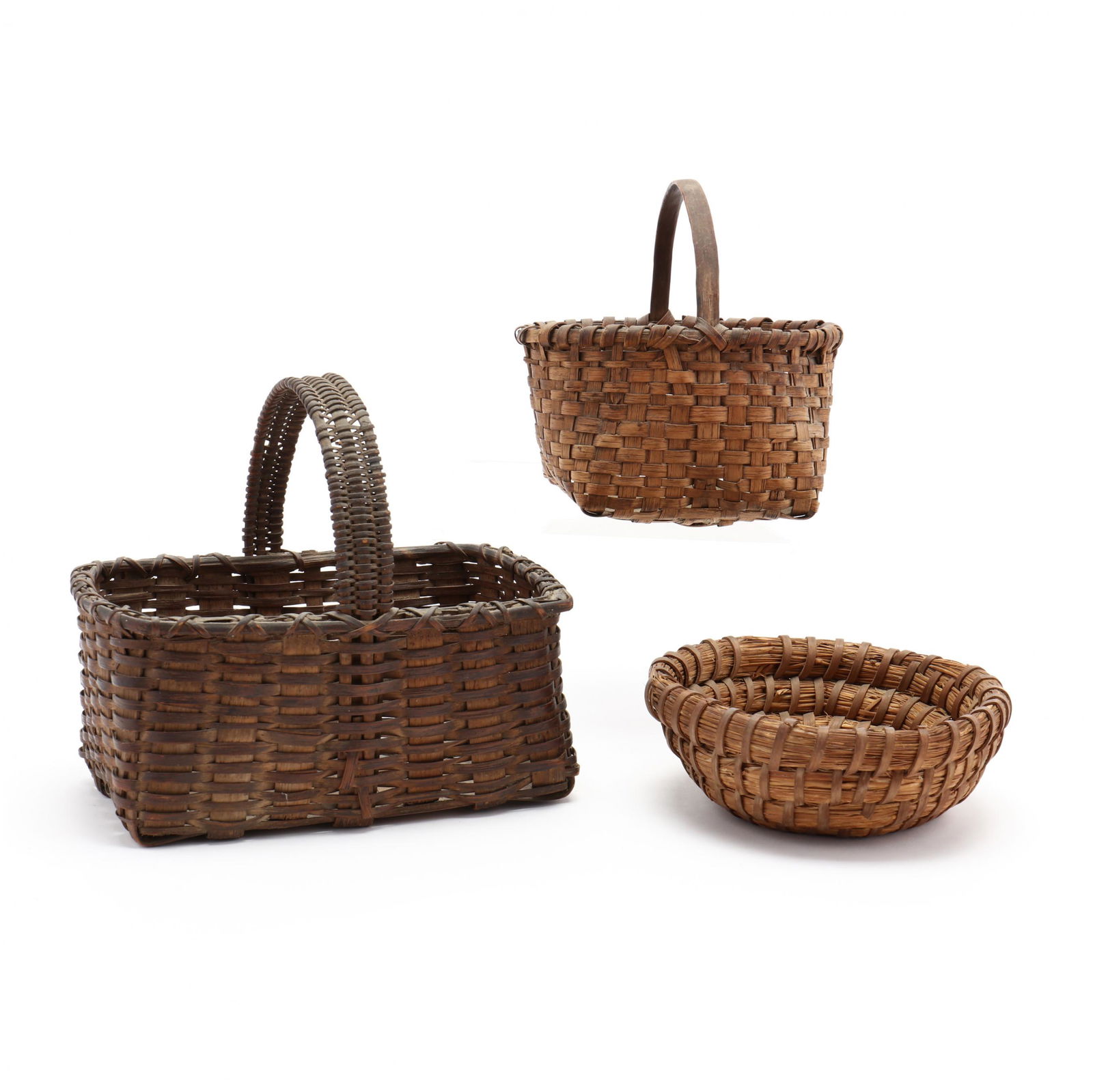 Three Small Vintage Baskets: Three Small Vintage BasketsTwo oak splint egg baskets (rectangular one with loss of rim wraps, handle wraps) (8.5 in.); an oval form (with tiny lower edge nick); a small SC coiled rye grass basket (so