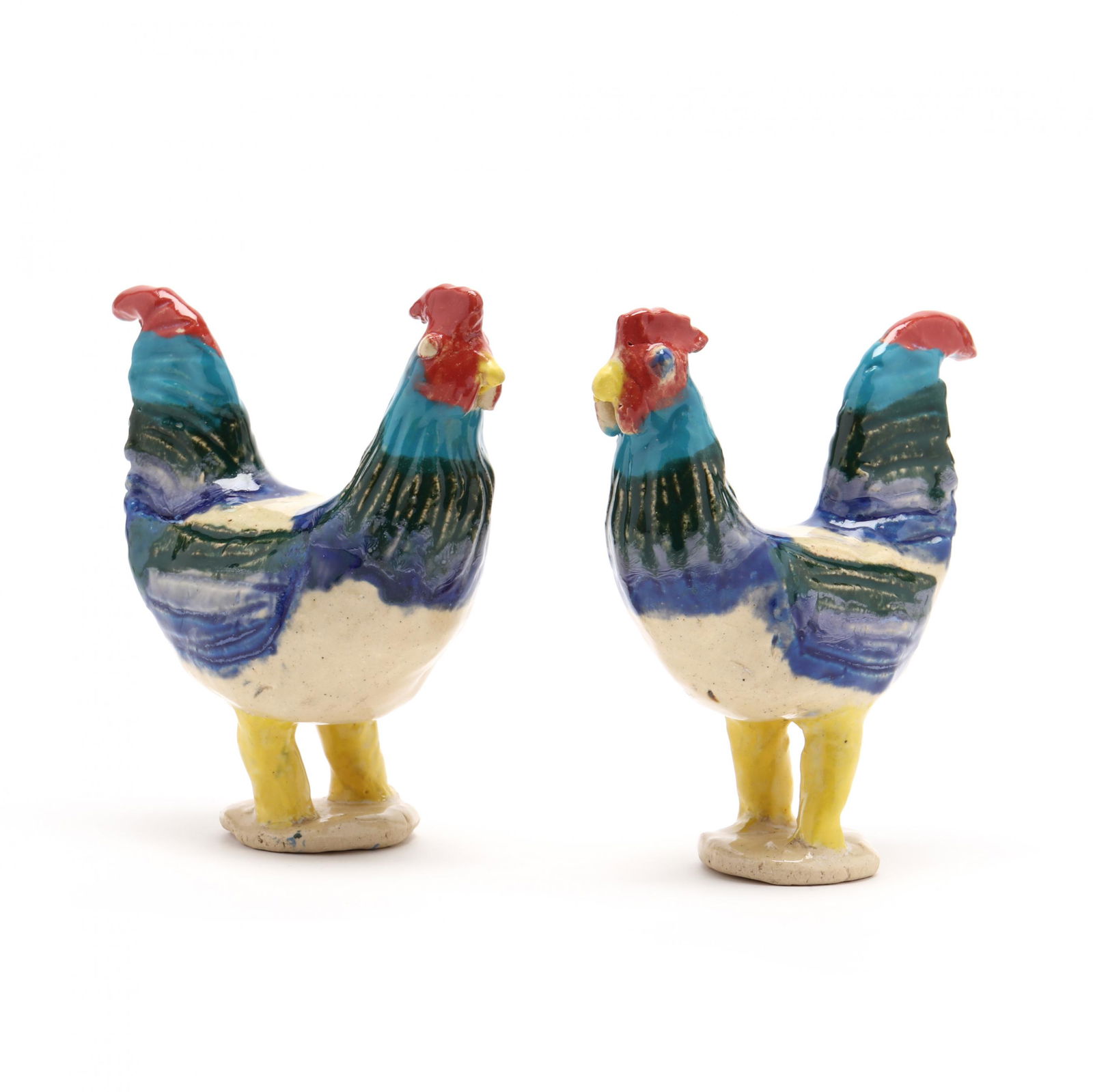 NC Folk Pottery, Charles Moore Roosters: NC Folk Pottery, Charles Moore Roostersan unusually diminutive pair molded and decorated in a bright polychrome glaze, inscribed on the bottom and dated '04. 5.25 in. From the Collection of the late B