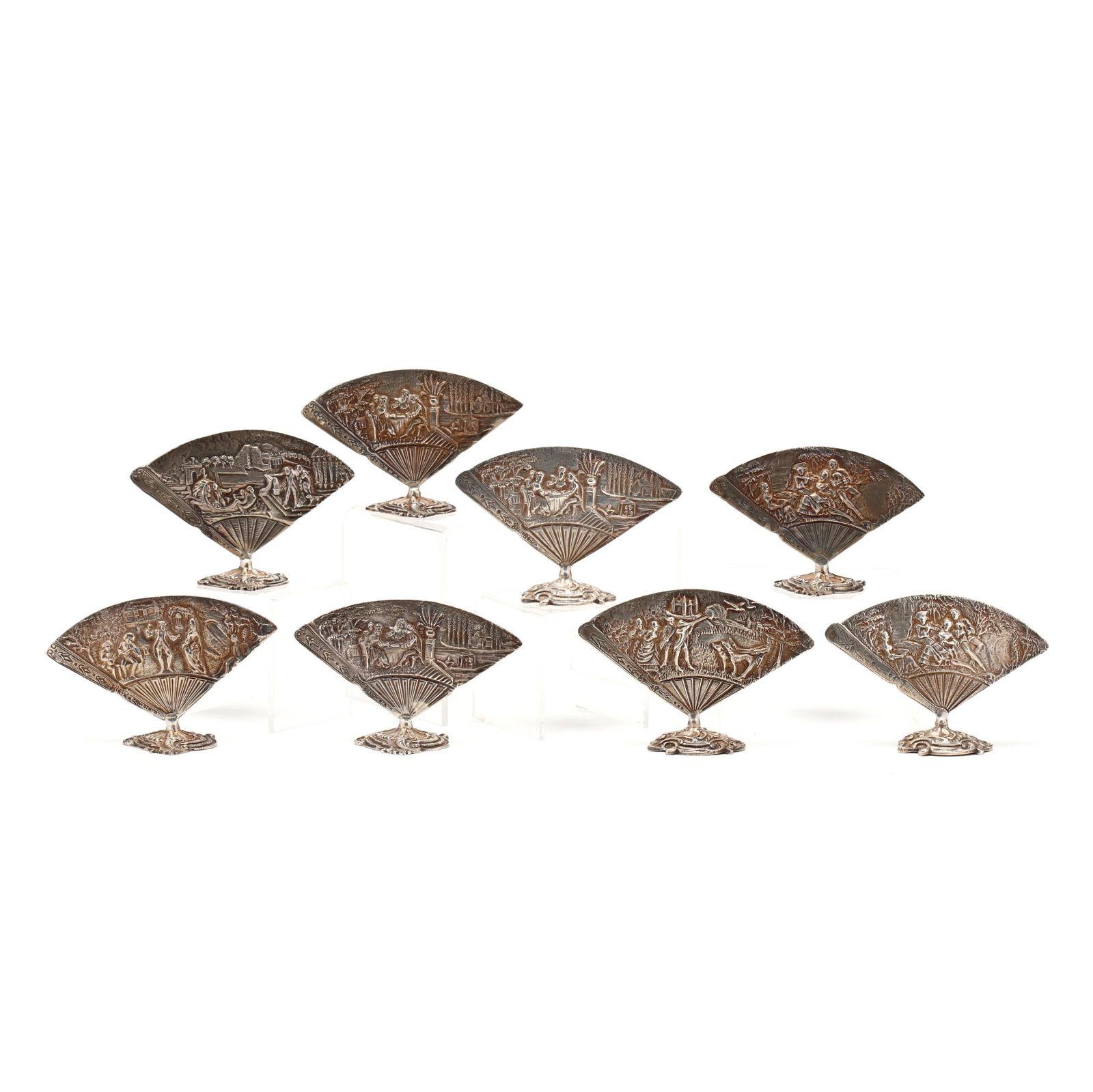 Set of Eight French 1st Standard Silver Menu Holders: Set of Eight French 1st Standard Silver Menu Holderscirca 1900, various maker's marks, several with Minerva mark to base, each in the form of a fan with figural scenes to one side. each approximately