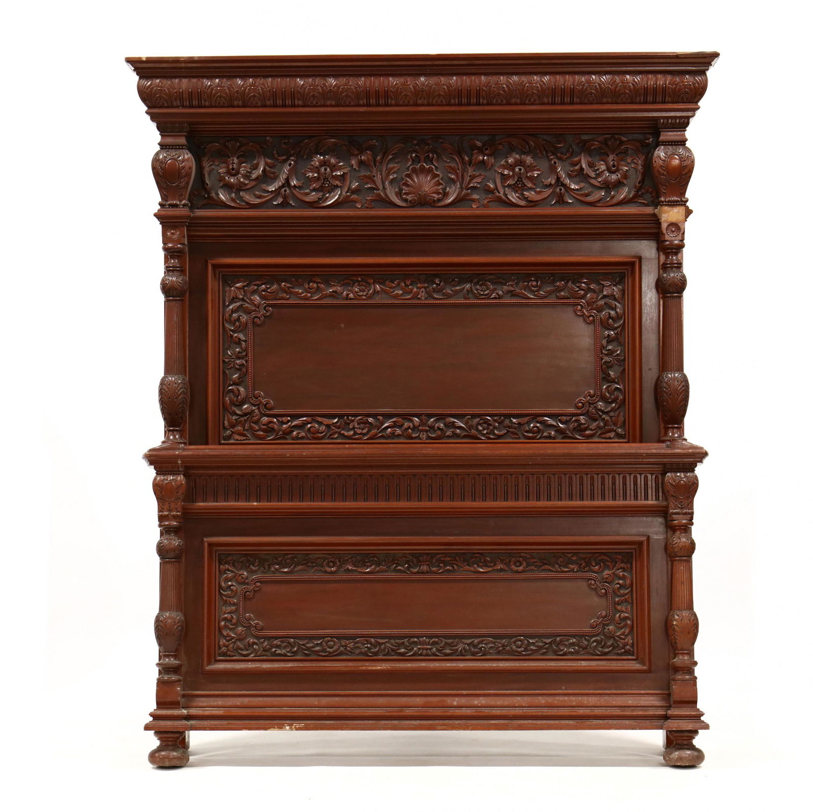 att. R.J. Horner & Co., Carved Mahogany Full Size Bed: att. R.J. Horner & Co., Carved Mahogany Full Size Bedlate 19th century, well-developed tall headboard featuring relief carved panels with foliate decoration, three-quarter carved columns with conformi