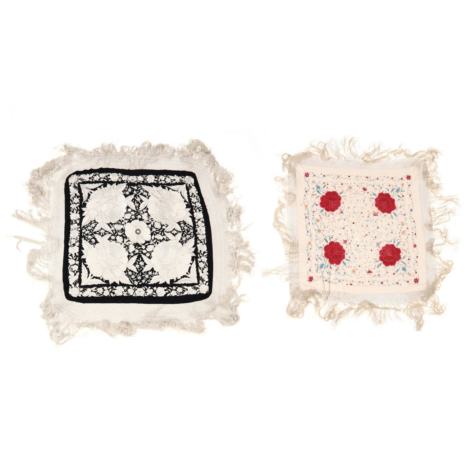 Two Antique Silk Piano Shawls: Two Antique Silk Piano Shawls one of cream silk embroidered with colorful flowers (several stains) (50 x 50 in. not including fringe); the second has a black silk filed with (60 x 58 in. not including