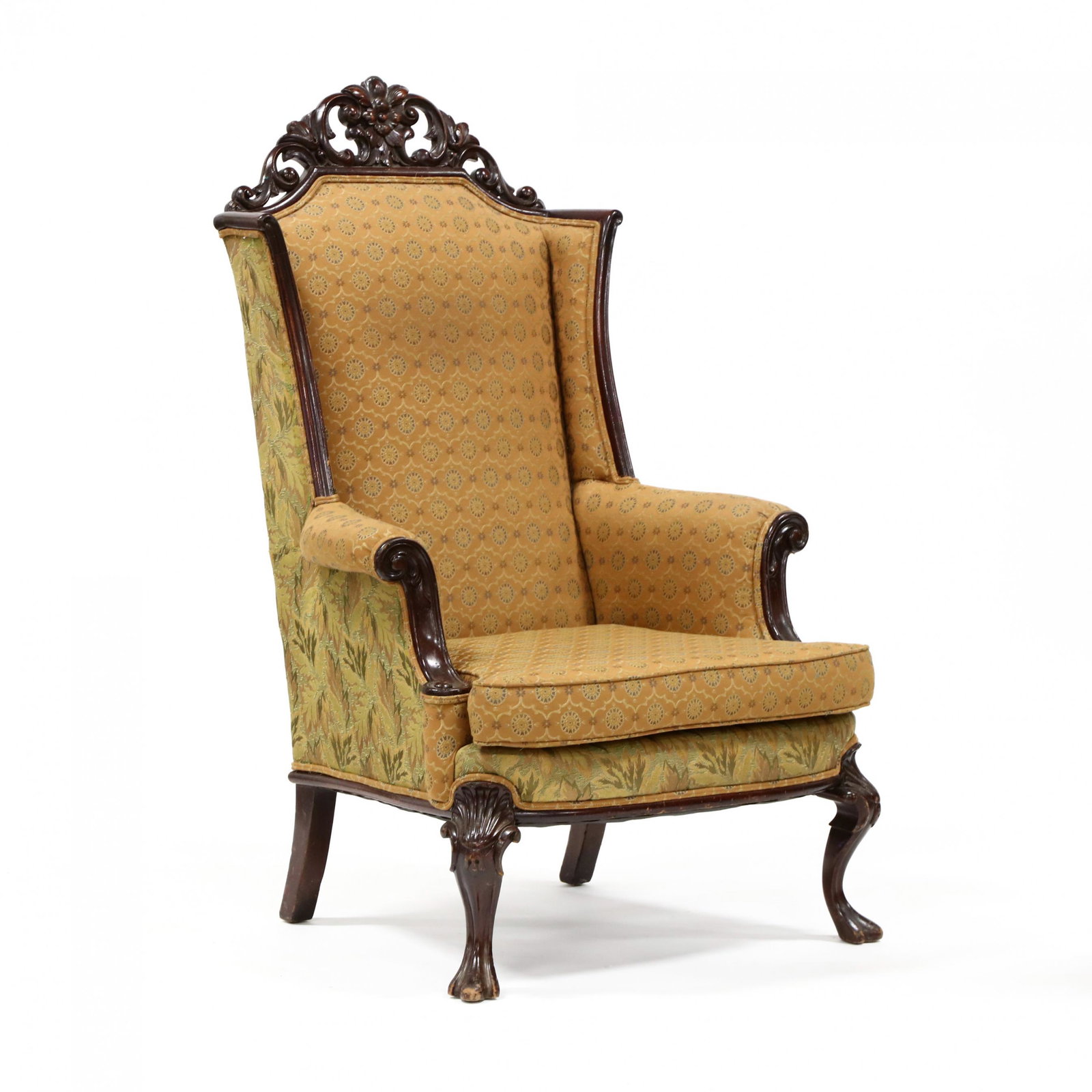 American Rococo Style Carved Mahogany Armchair: American Rococo Style Carved Mahogany Armchair circa 1900, relief carved and pierced crest rail, with varying upholstery, loose cushion, on cabriole legs with drake feet. 52 x 34 x 34 in. Additional h