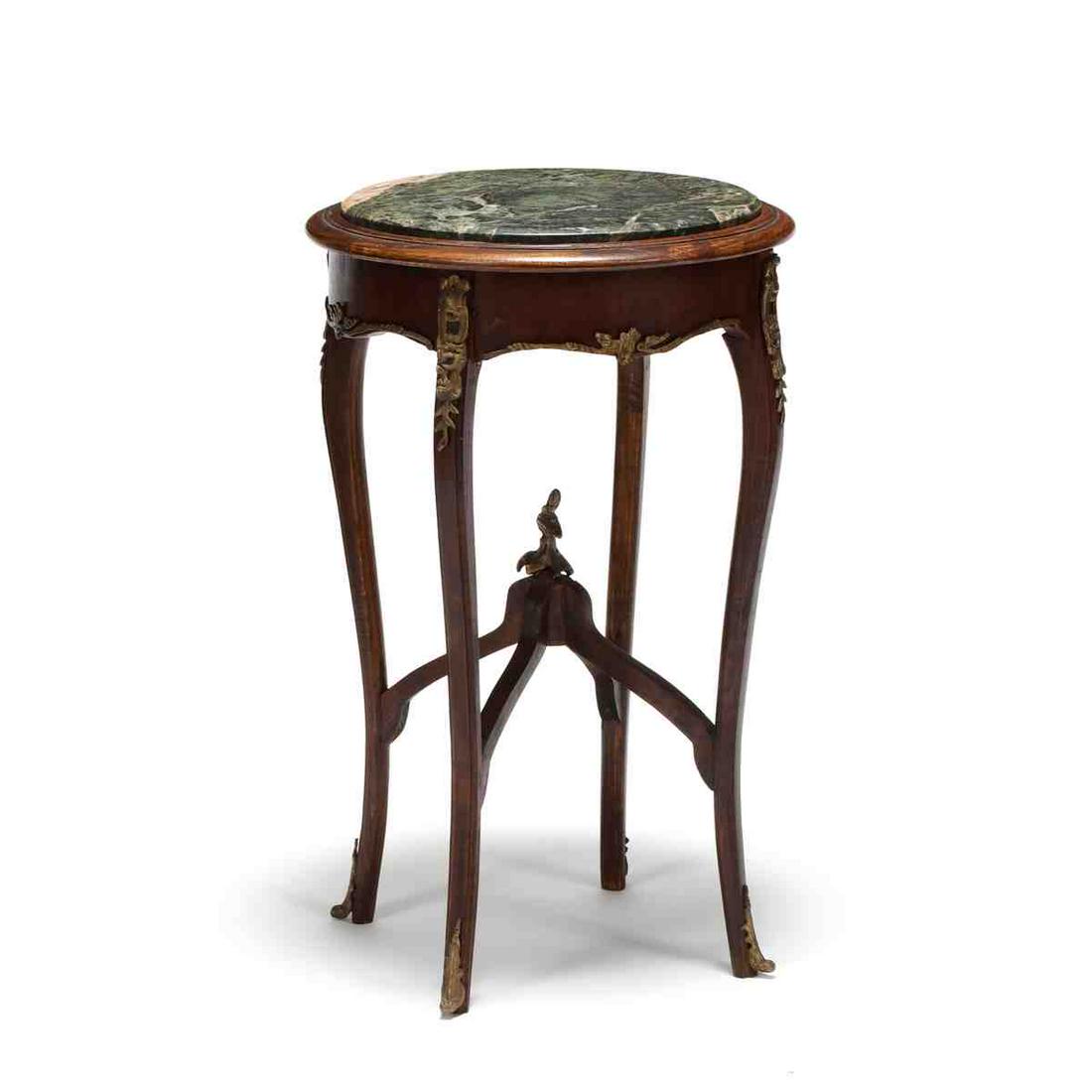 French Empire Style Marble Top Stand: French Empire Style Marble Top Stand late 20th century, inset circular green marble top, mahogany, raised on tall cabriole legs with stretcher and ormolu mounts. 31 x 19 in. diameter Additional high-r