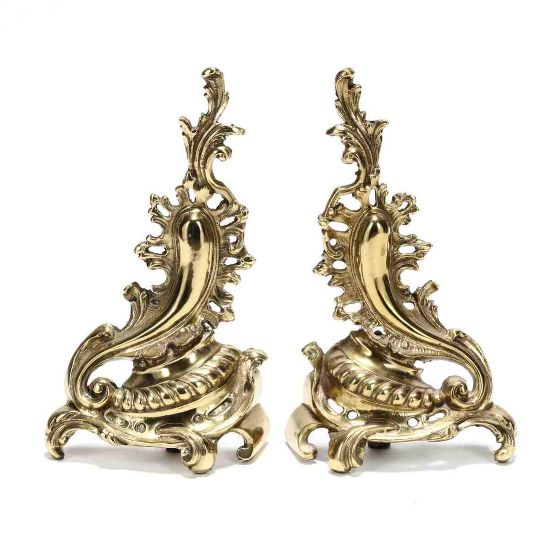 Pair of French Rococo Style Brass Chenets: Pair of French Rococo Style Brass Chenets mid 20th century, cast and gilt brass. 16 x 11 x 5 in. Additional high-resolution photos are available at LelandLittle.com