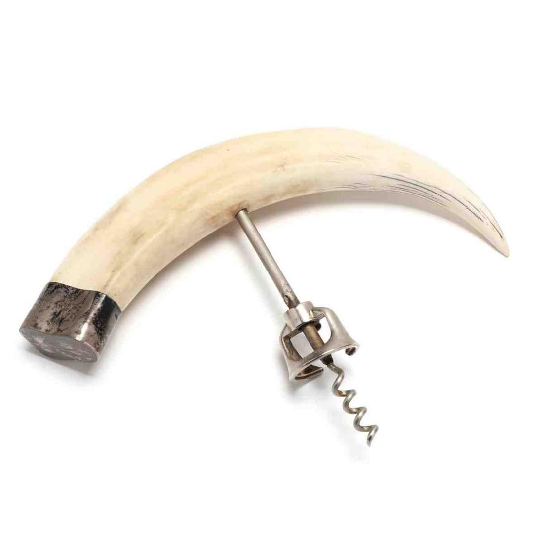 Antique Tusk and Sterling Silver Wine Cork: Antique Tusk and Sterling Silver Wine Cork large natural tusk with hallmarked sterling silver ferrule. 9 in. Private Collection, Raleigh, North Carolina Additional high-resolution photos are available