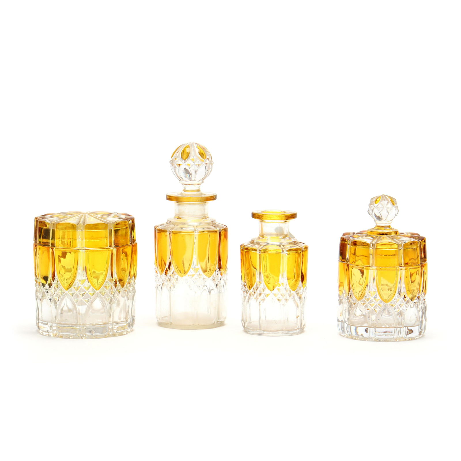 Val St. Lambert, Four Crystal Dressing Table: Val St. Lambert, Four Crystal Dressing Table AccessoriesBelgium, canary and clear glass, a pattern of upright and inverted arches interspersed with cut diamonds, the lidded jar is signed. Larger Flask