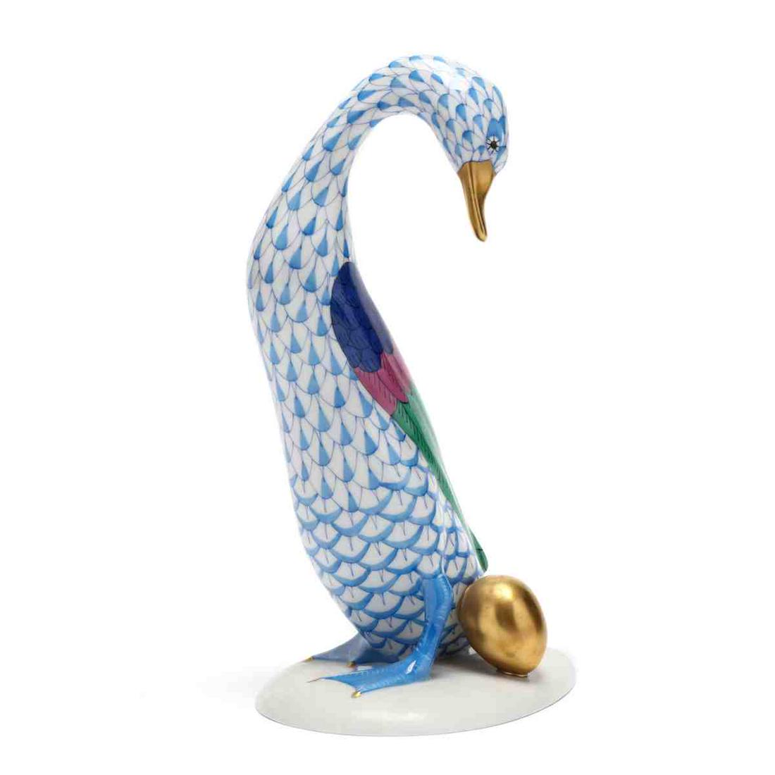 Herend Porcelain Fishnet Goose with Golden Egg: Herend Porcelain Fishnet Goose with Golden Egg marked to underside. 7.5 in. Additional high-resolution photos are available at LelandLittle.com
